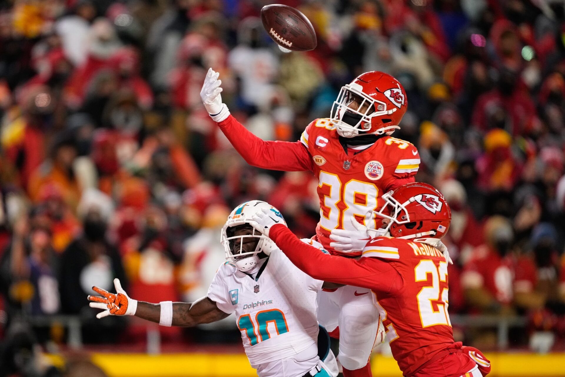 Kansas City Chiefs CB L'Jarius Sneed (38) breaks up a pass against the Miami Dolphins.