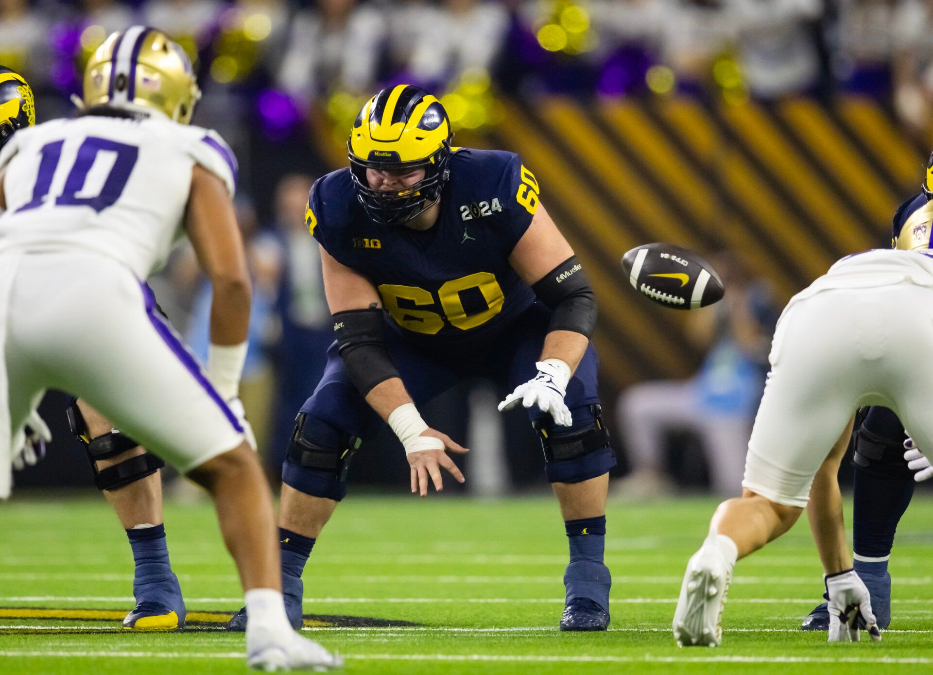 Michigan Wolverines offensive lineman Drake Nugent (60) against the Washington Huskies during the 2024 College Football Playoff national championship game at NRG Stadium.