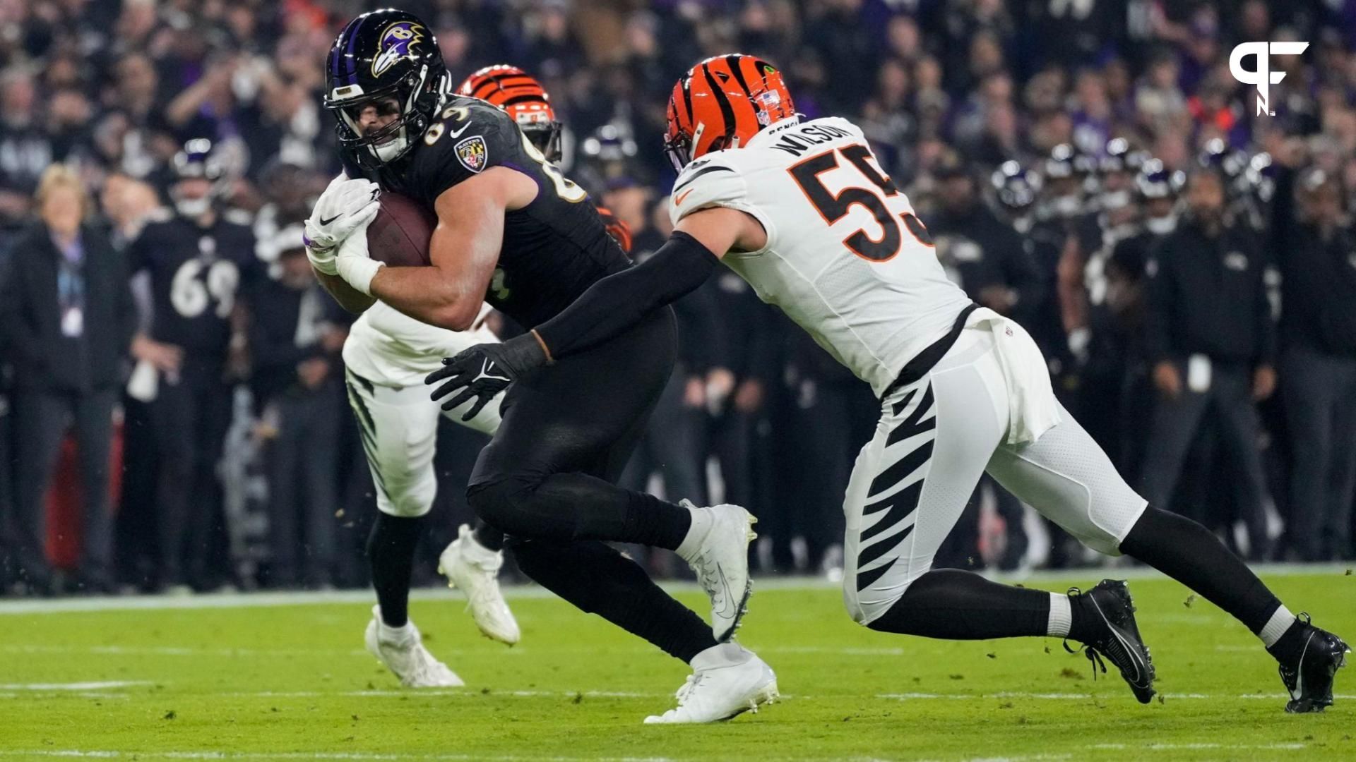 Baltimore Ravens tight end Mark Andrews (89) fights a tackle from Cincinnati Bengals linebacker Logan Wilson (55) in the first quarter in the first quarter at M&T Bank Stadium.