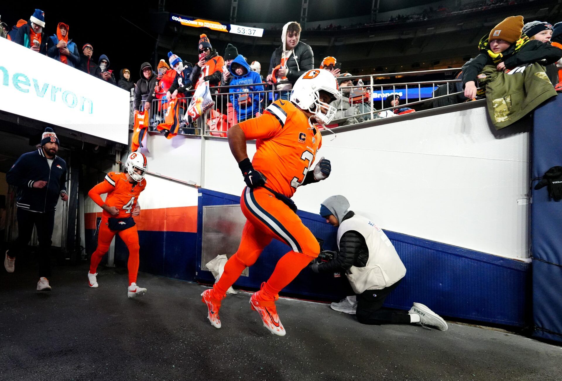 Denver Broncos QB Russell Wilson (3) runs out of the tunnel.