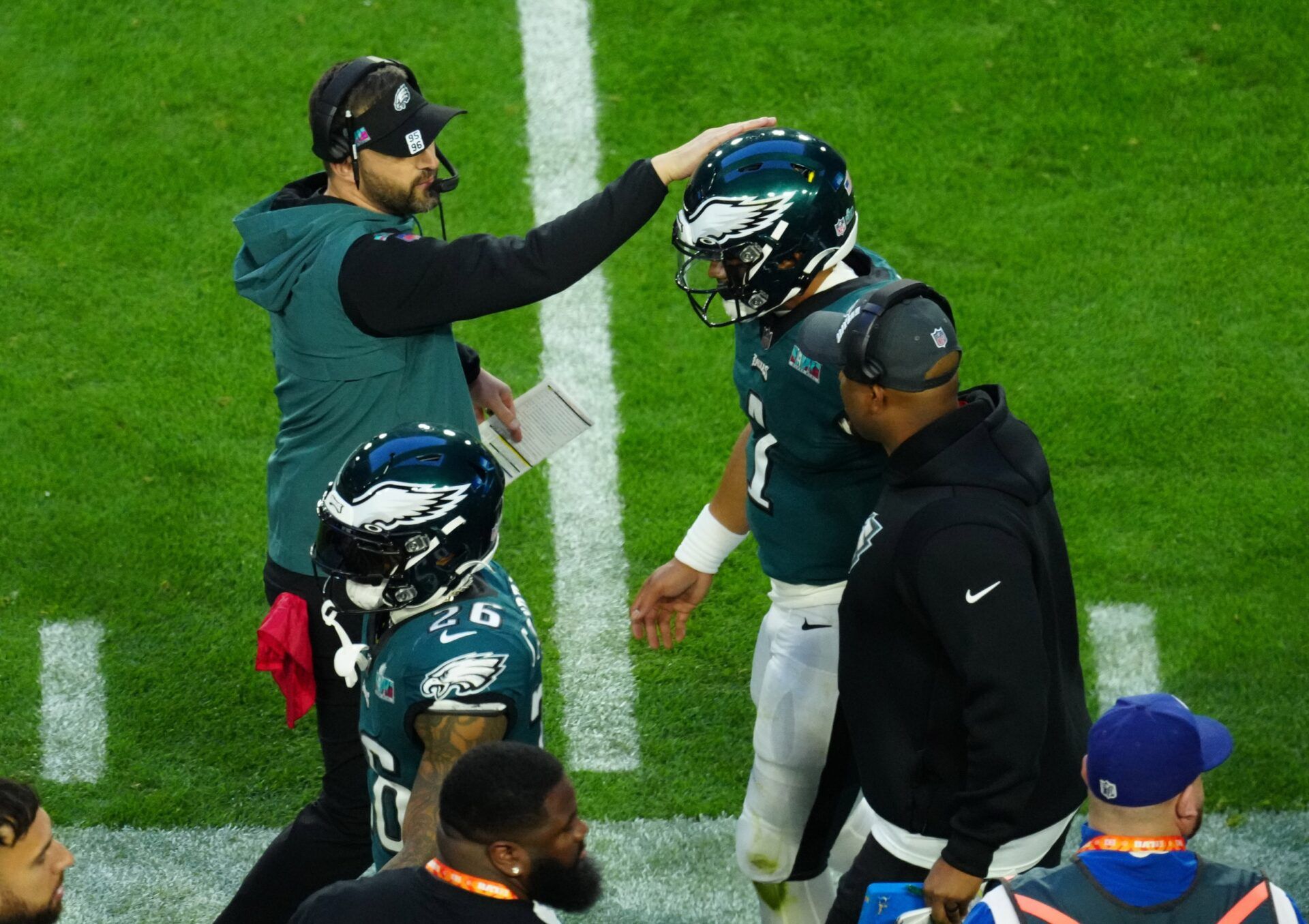 Philadelphia Eagles quarterback Jalen Hurts (1) celebrates with Philadelphia Eagles head coach Nick Sirianni after scoring a touchdown against the Kansas City Chiefs during the first half in Super Bowl LVII at State Farm Stadium.