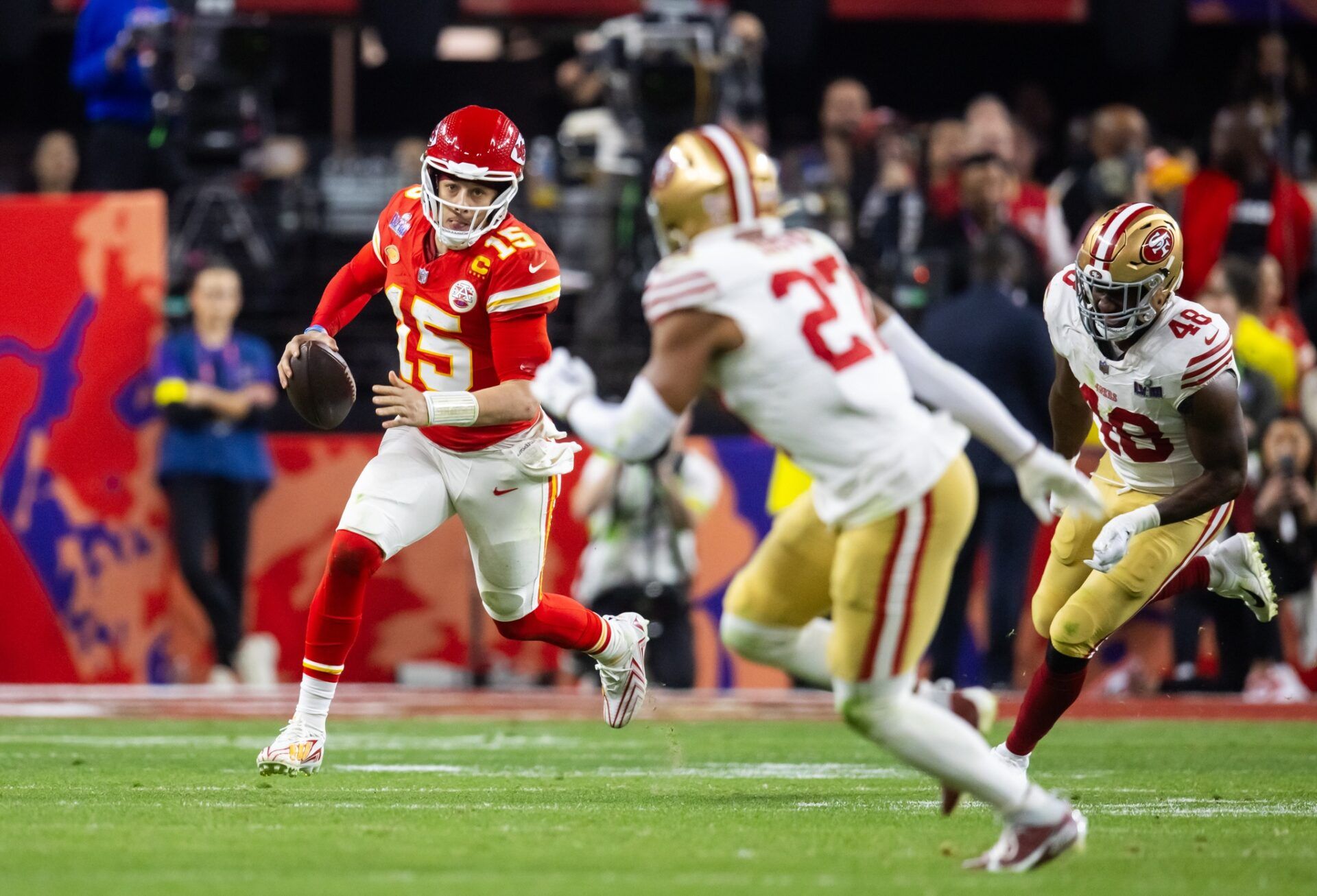 Kansas City Chiefs QB Patrick Mahomes (15) takes off running against the San Francisco 49ers in the Super Bowl.