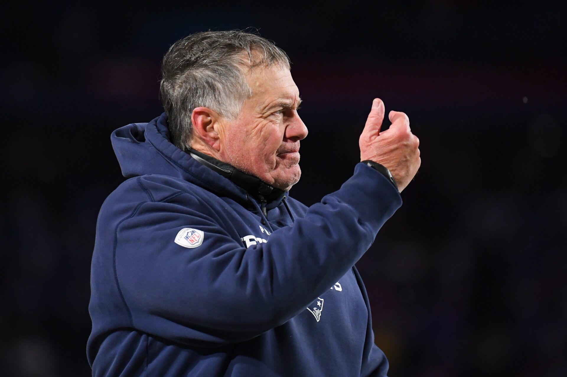 New England Patriots head coach Bill Belichick gestures to quarterback Mac Jones (not pictured).