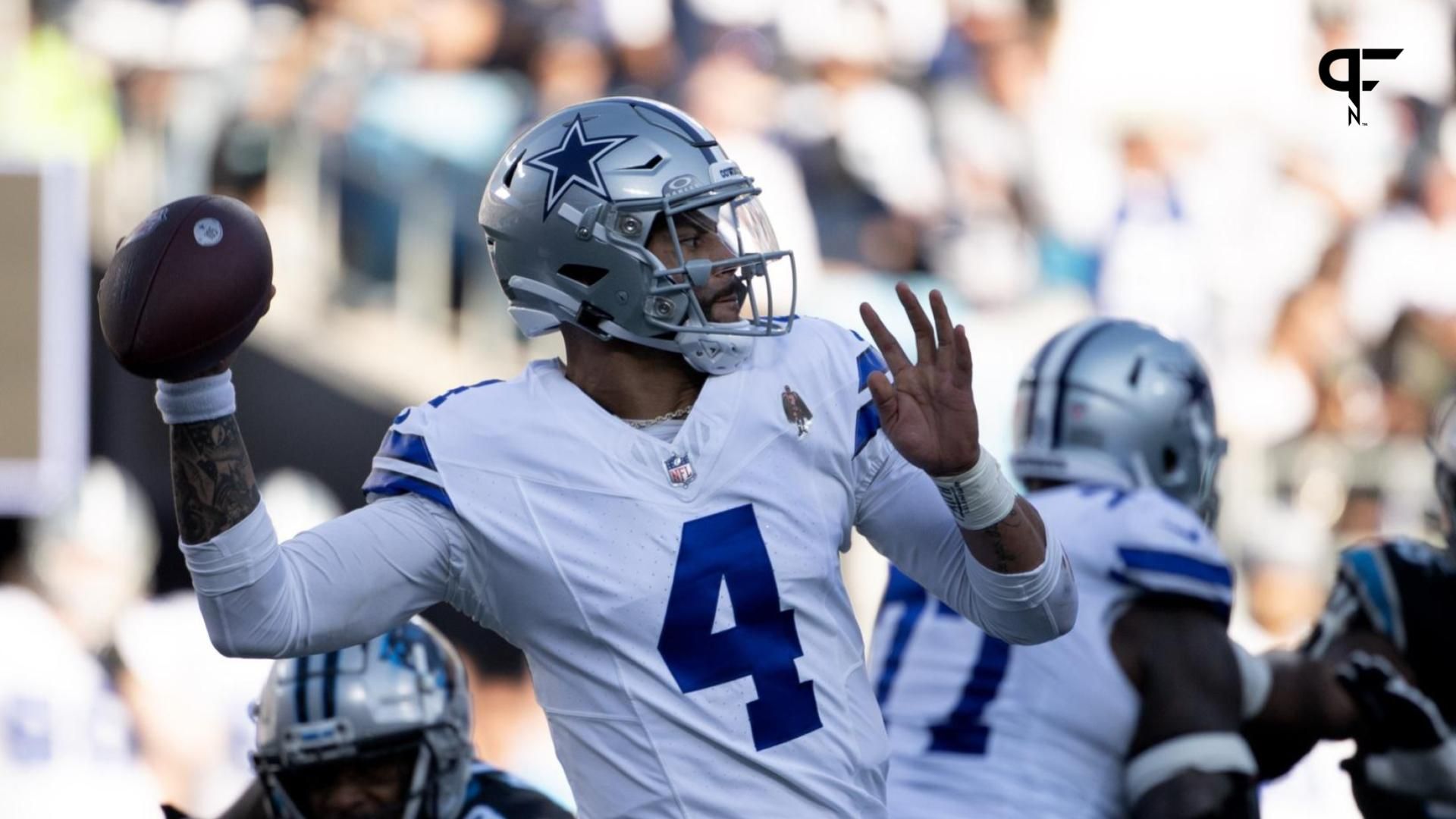 Dallas Cowboys quarterback Dak Prescott (4) looks to pass in the third quarter at Bank of America Stadium.