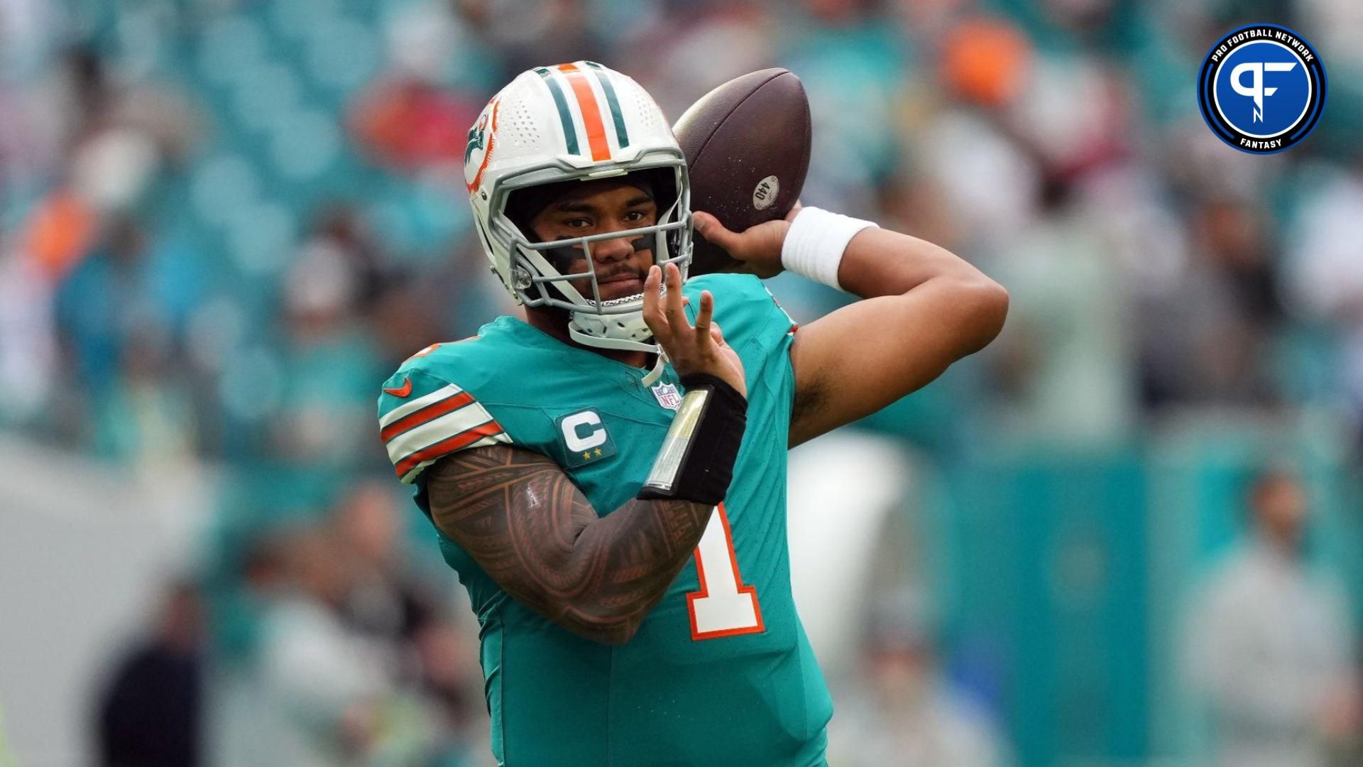 Miami Dolphins quarterback Tua Tagovailoa (1) warms up prior to the game against the Dallas Cowboys at Hard Rock Stadium.