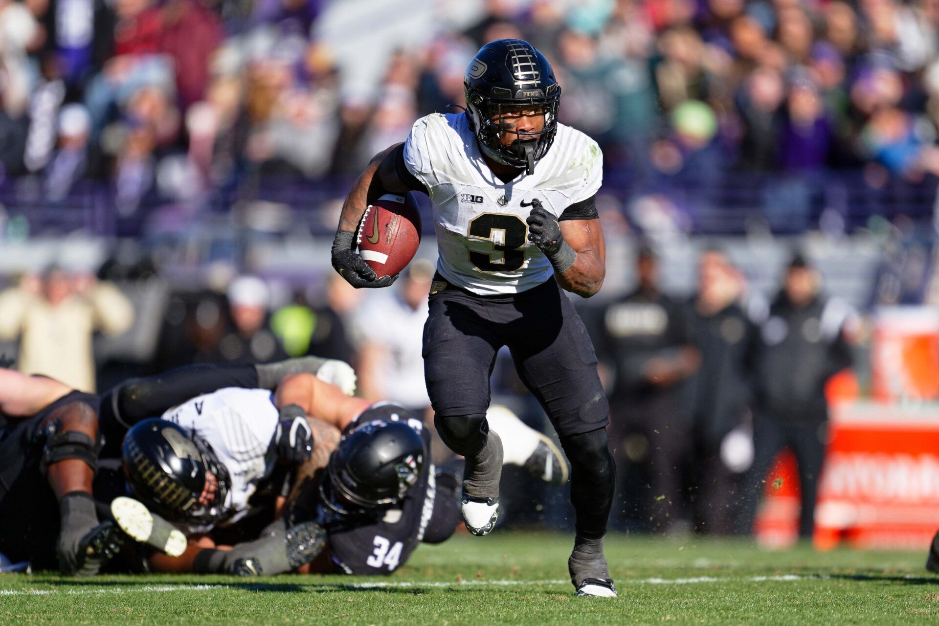 Purdue Boilermakers running back Tyrone Tracy Jr. (3) runs with the ball against the Northwestern Wildcats at Ryan Field.