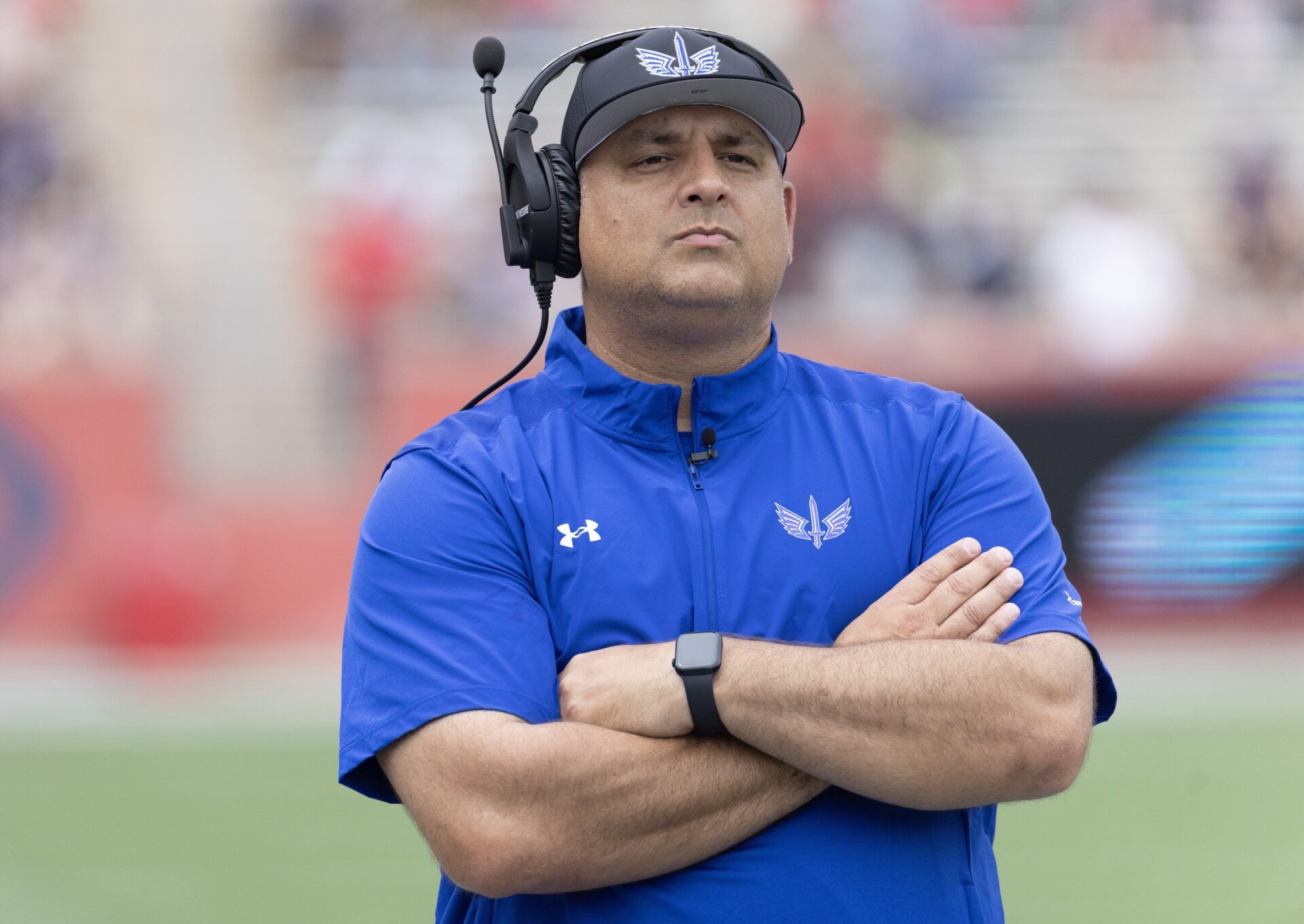 St. Louis Battlehawks head coach Anthony Becht walks the sidelines as his team plays against the Houston Roughnecks in the second quarter at TDECU Stadium.