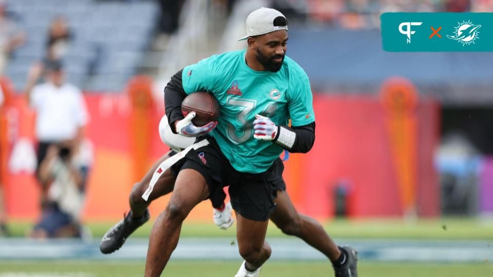 AFC running back Raheem Mostert (31) of the Miami Dolphins rushes the ball past NFC cornerback DaRon Bland (26) of the Dallas Cowboys during the 2024 Pro Bowl at Camping World Stadium.