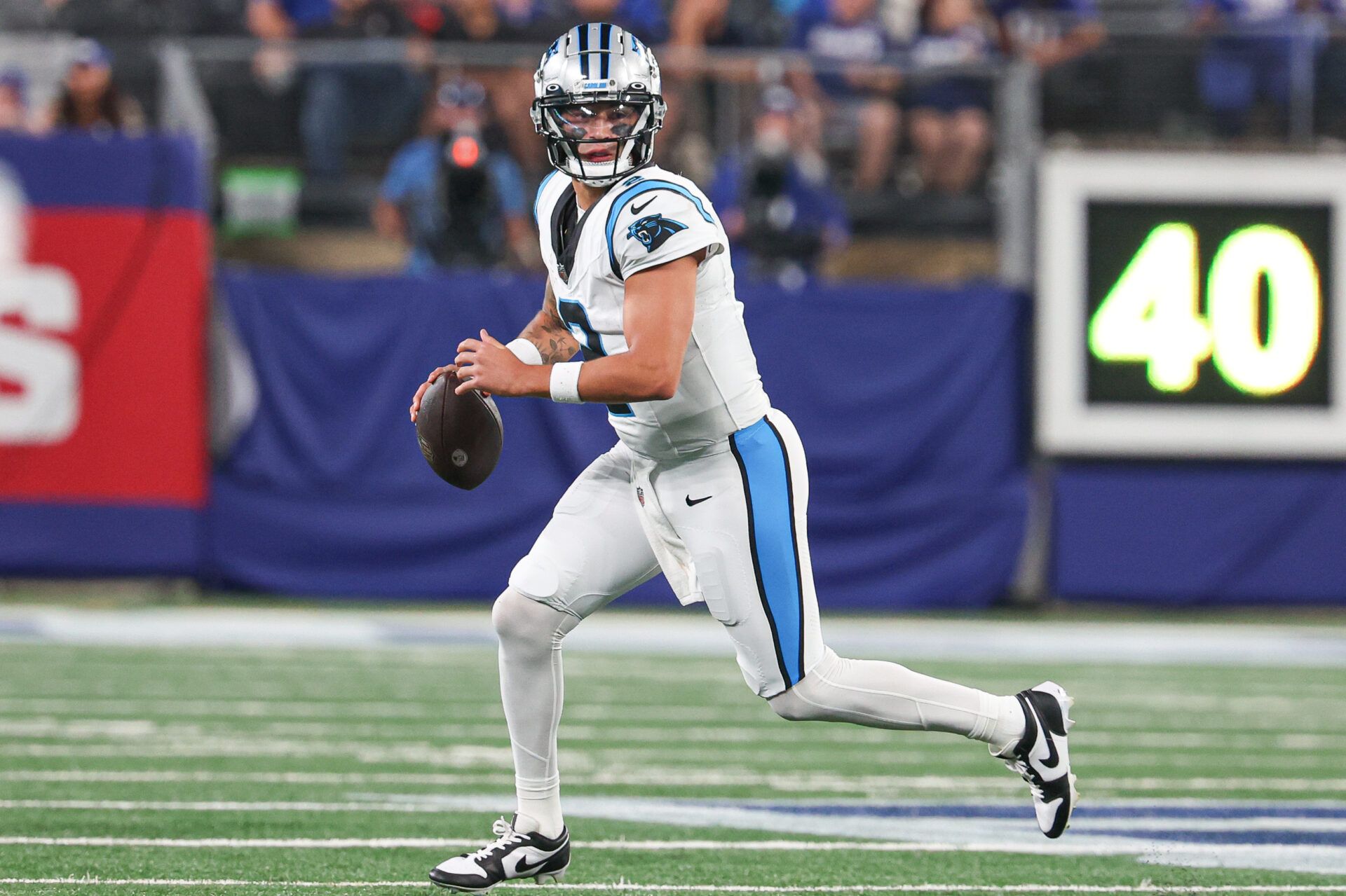 Carolina Panthers quarterback Matt Corral (2) scrambles during the second half against the New York Giants at MetLife Stadium.