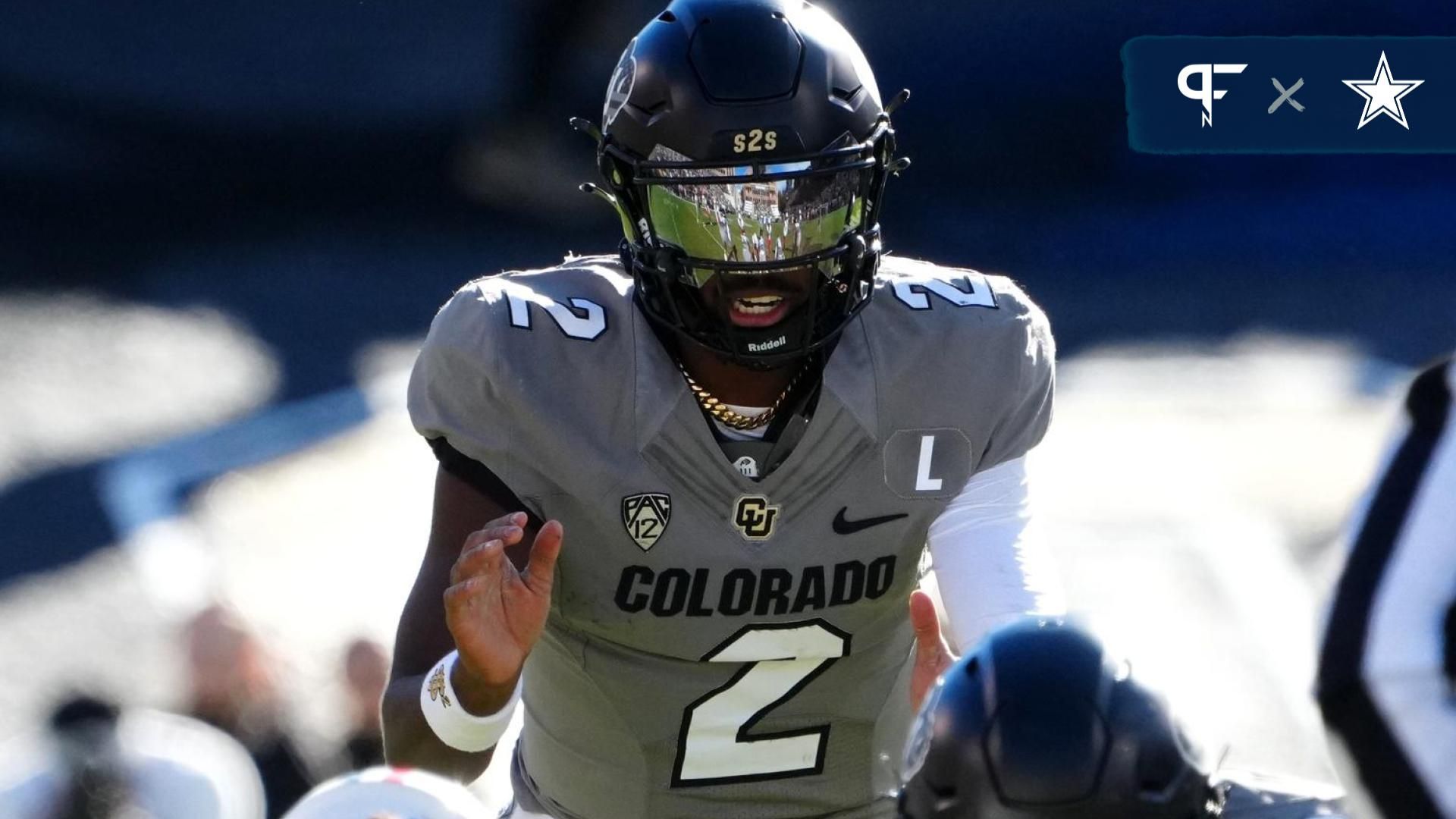 Colorado Buffaloes quarterback Shedeur Sanders (2) at the line of scrimmage in the first half against the Arizona Wildcats at Folsom Field.