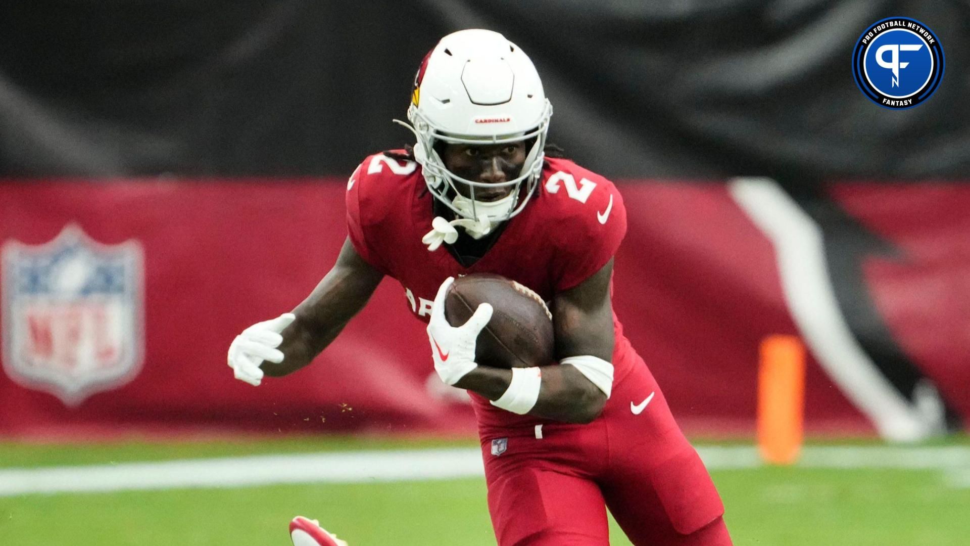 Arizona Cardinals wide receiver Marquise Brown (2) carries the ball past New York Giants safety Jason Pinnock (27) in the first half at State Farm Stadium.