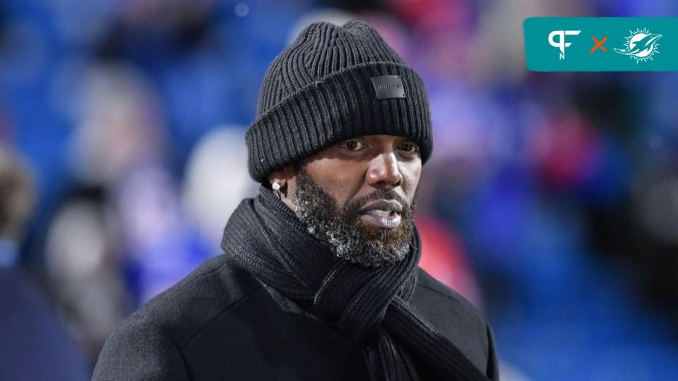 ESPN commentator and NFL Hall of Fame member Randy Moss on the sidelines before a game between the Buffalo Bills and New England Patriots at Highmark Stadium.