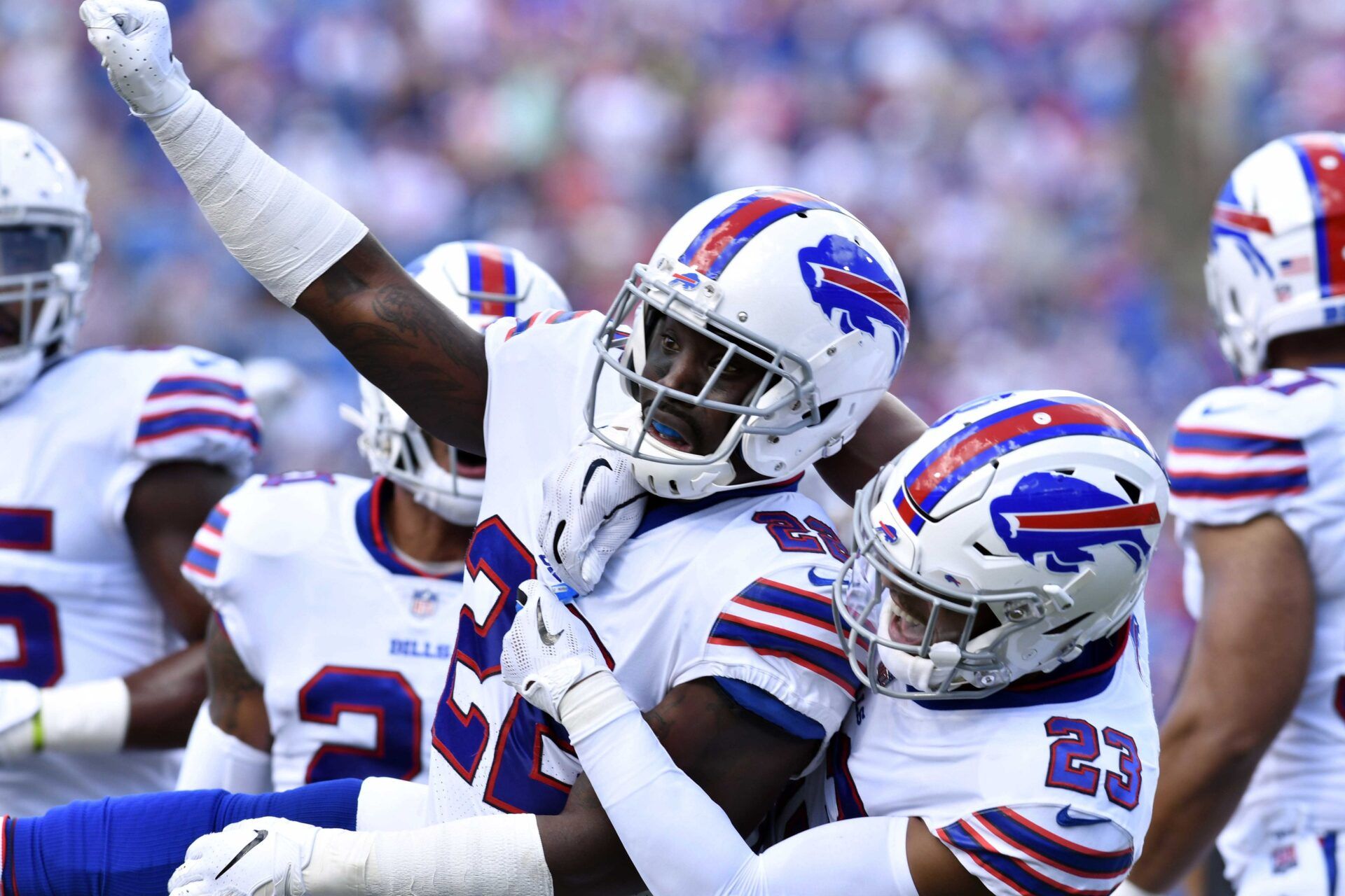 Buffalo Bills defensive back Vontae Davis (22) and defensive back Micah Hyde (23) celebrate making a stop on third down during the first quarter against the Los Angeles Chargers at New Era Field.