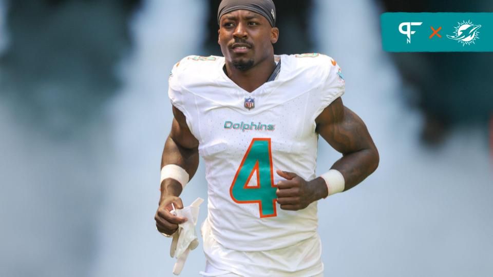 Miami Dolphins cornerback Kader Kohou (4) runs onto the field before a game against the Denver Broncos at Hard Rock Stadium.