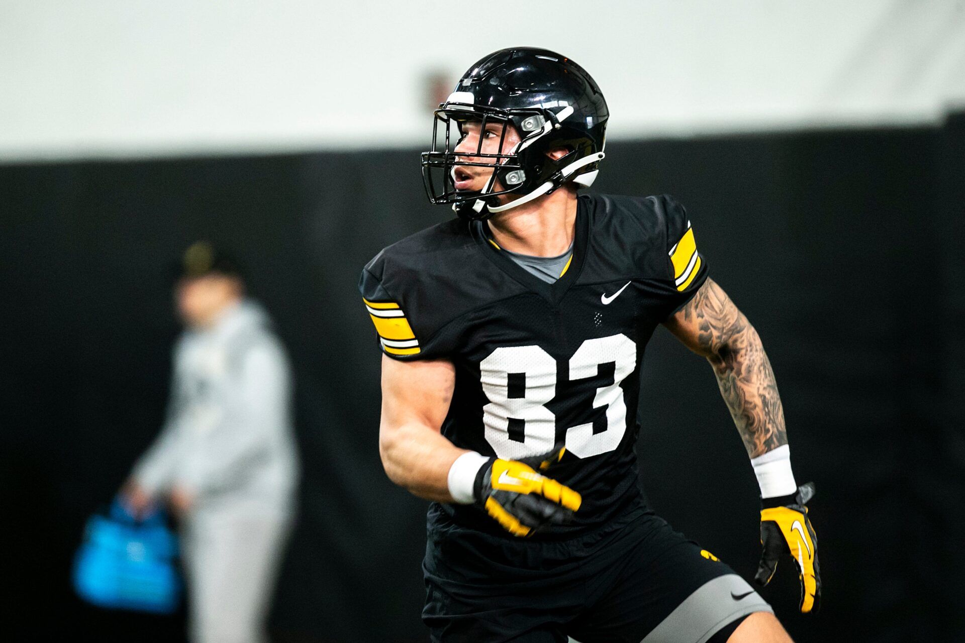 Iowa tight end Erick All (83) runs a route during a spring NCAA football practice, Thursday, March 30, 2023, at the University of Iowa Indoor Practice Facility in Iowa City, Iowa.