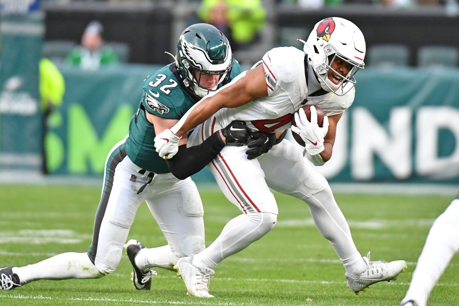 Arizona Cardinals wide receiver Rondale Moore (4) is tackled by Philadelphia Eagles safety Reed Blankenship (32) during the fourth quarter at Lincoln Financial Field.