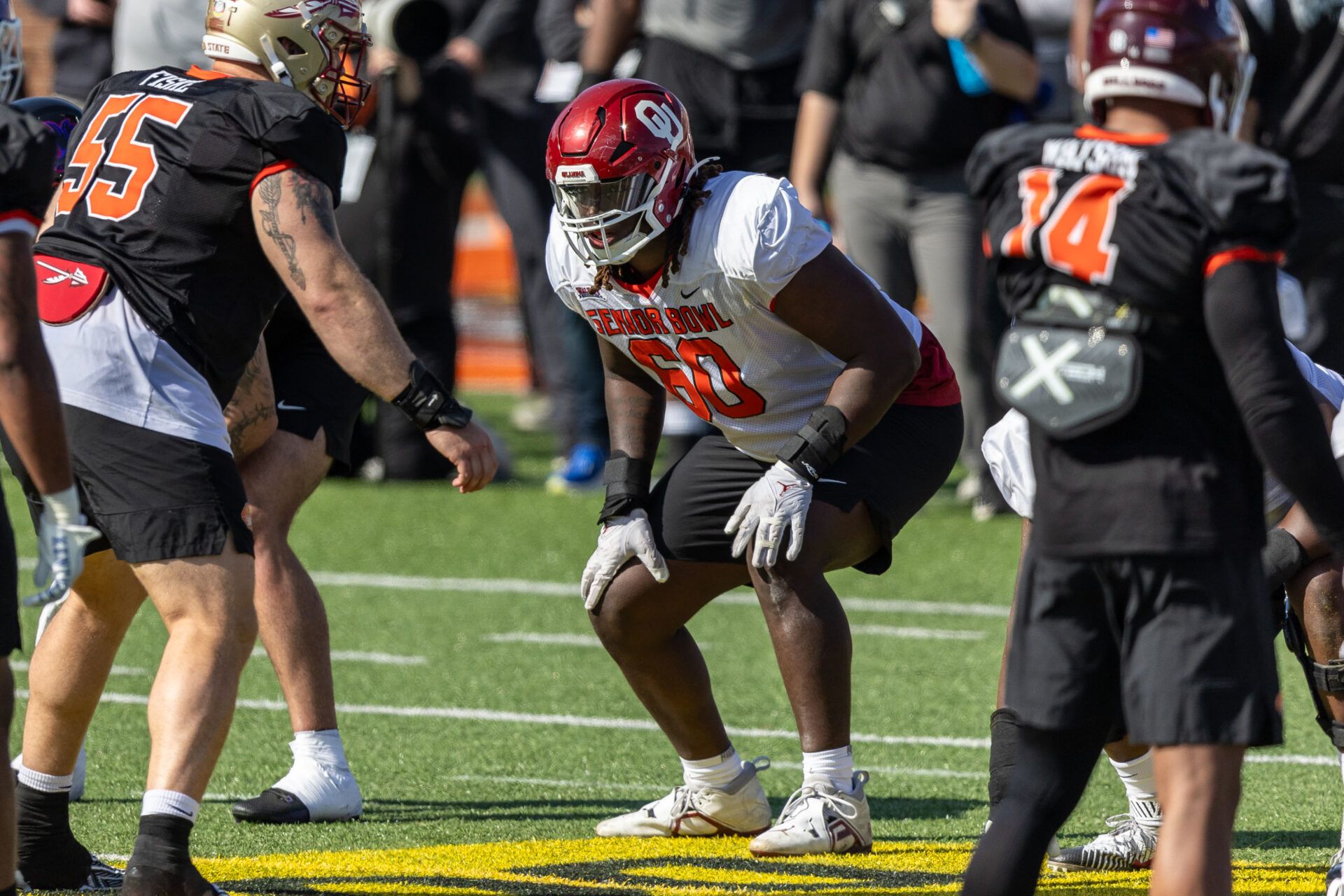 American offensive lineman Tyler Guyton of Oklahoma (60) gets set on the line during practice for the American team at Hancock Whitney Stadium.