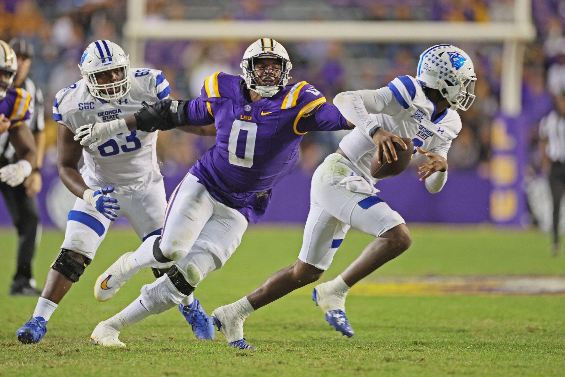 LSU Tigers defensive tackle Maason Smith (0) pressures Georgia State Panthers quarterback Darren Grainger (3) in third quarter action at Tiger Stadium.