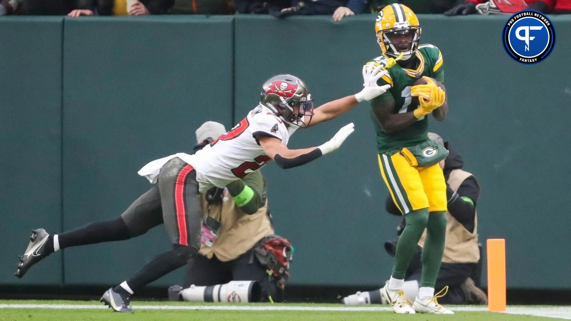 Green Bay Packers wide receiver Jayden Reed (11) makes a touchdown reception against the Tampa Bay Buccaneers on Sunday, December 17, 2023, at Lambeau Field in Green Bay, Wis. Tampa Bay won the game, 34-20.