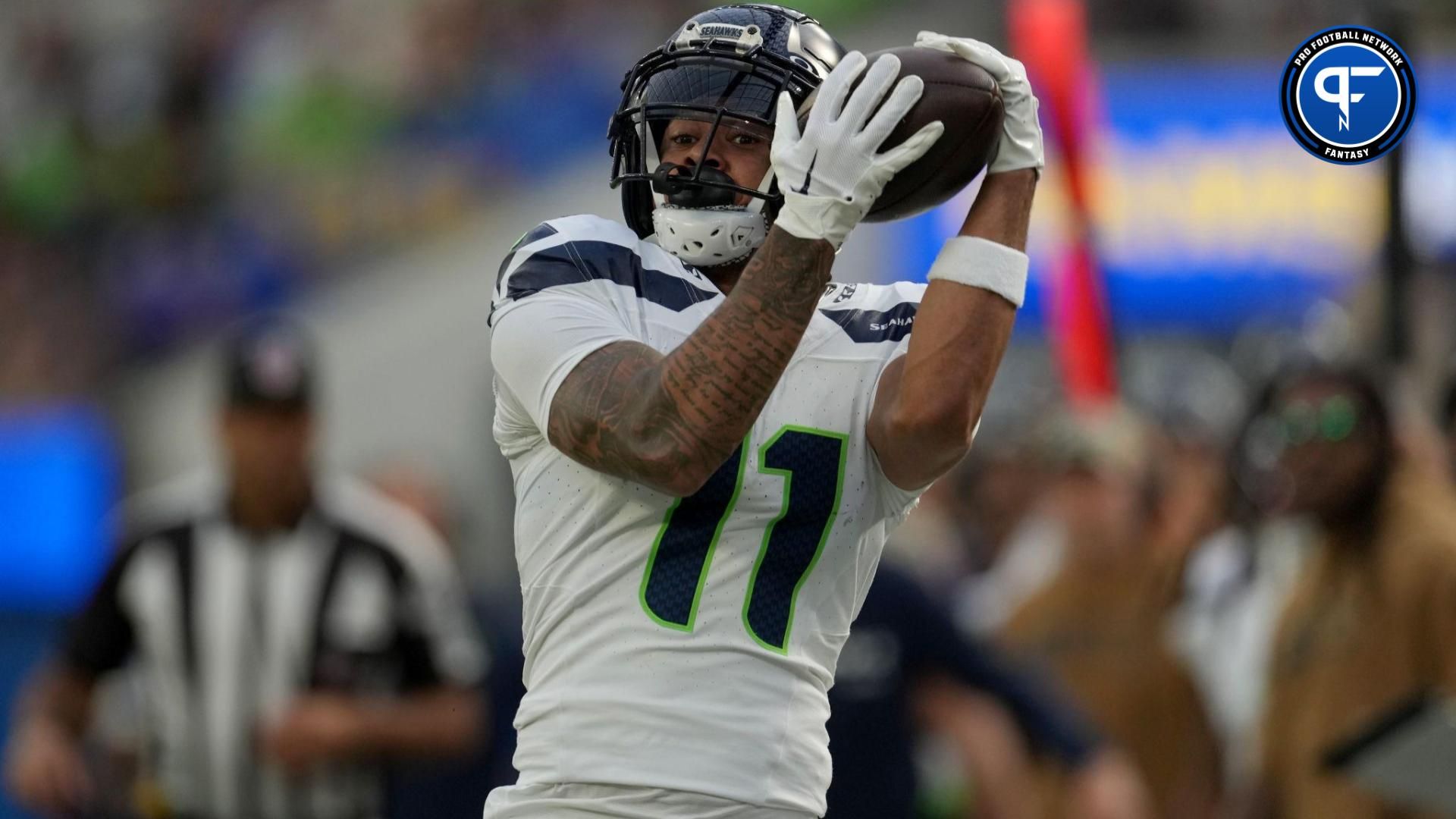 Seattle Seahawks WR Jaxon Smith-Njigba (11) makes a catch against the Los Angeles Rams.