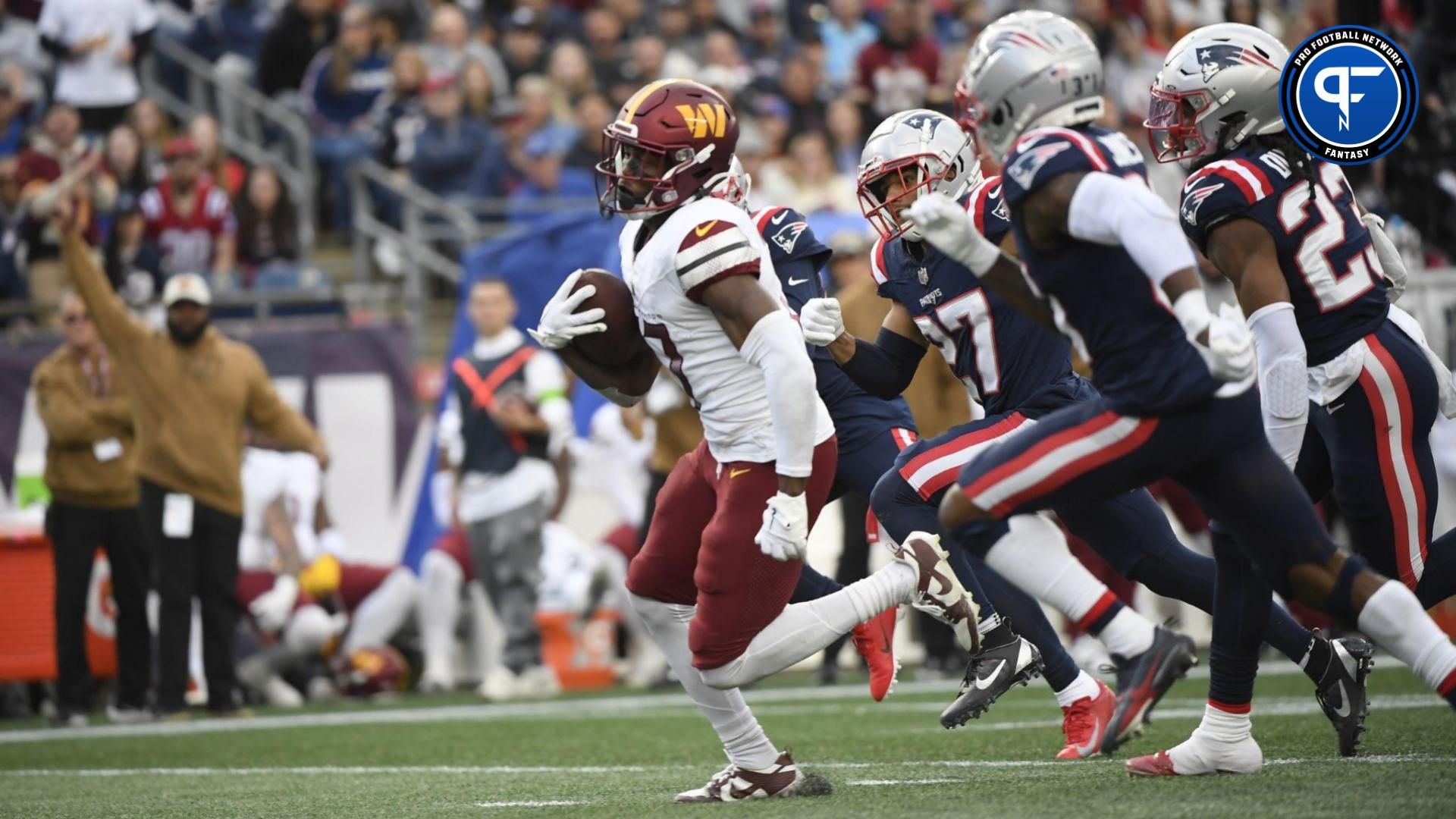 Washington Commanders wide receiver Terry McLaurin (17) runs with the ball during the second half against the New England Patriots at Gillette Stadium.