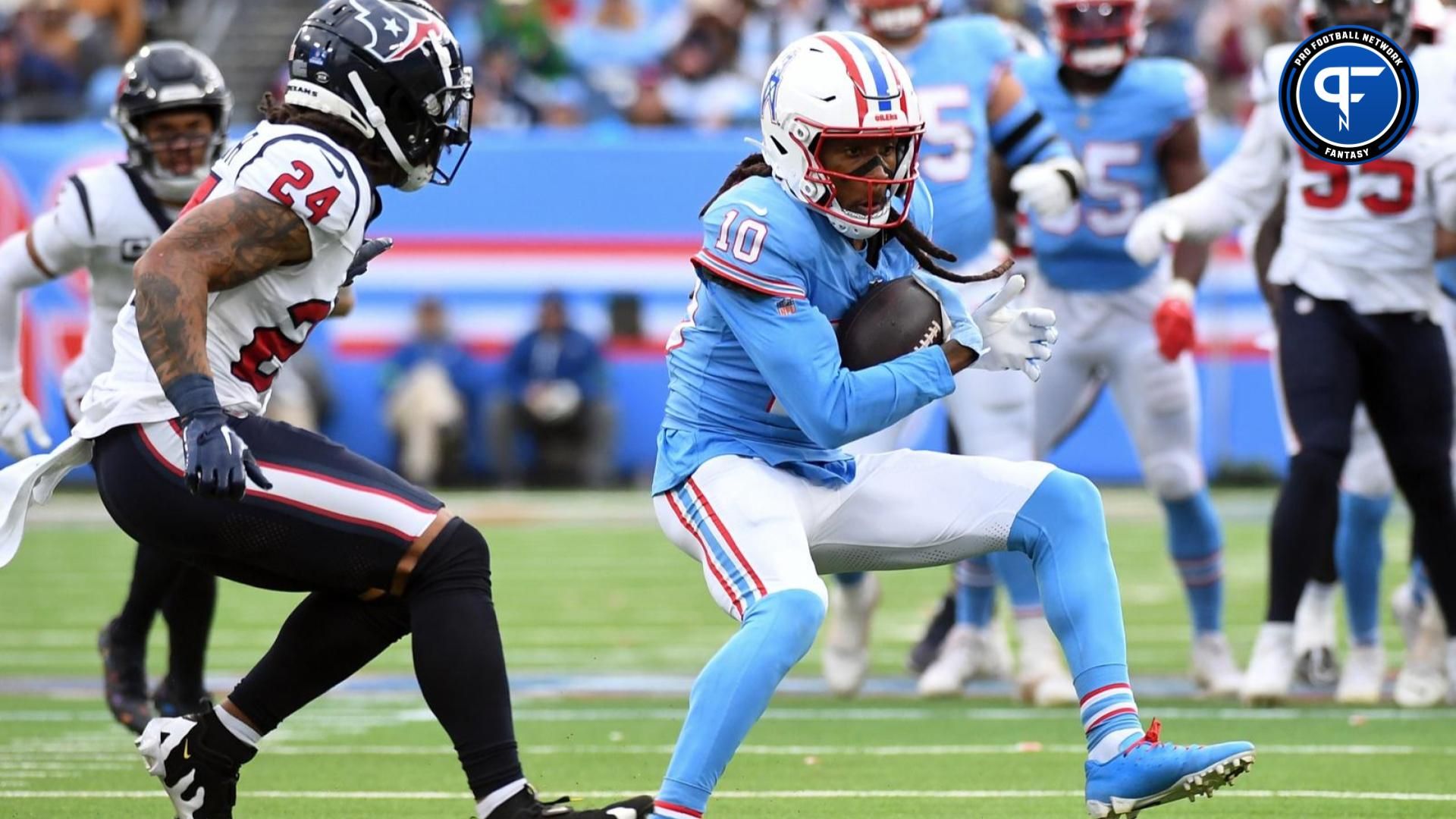 Tennessee Titans WR DeAndre Hopkins (10) runs after the catch against the Houston Texans.