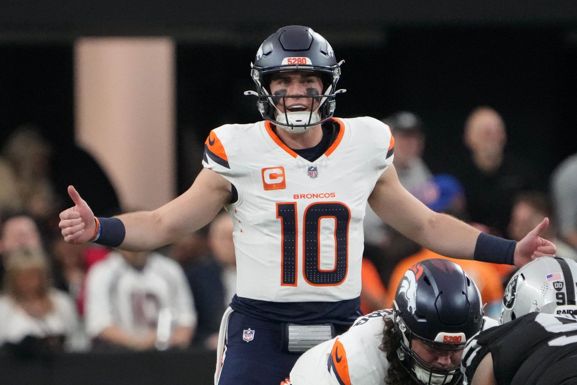 Nov 24, 2024; Paradise, Nevada, USA; Denver Broncos quarterback Bo Nix (10) gestures in the first half against the Las Vegas Raiders at Allegiant Stadium. Mandatory Credit: Kirby Lee-Imagn Images