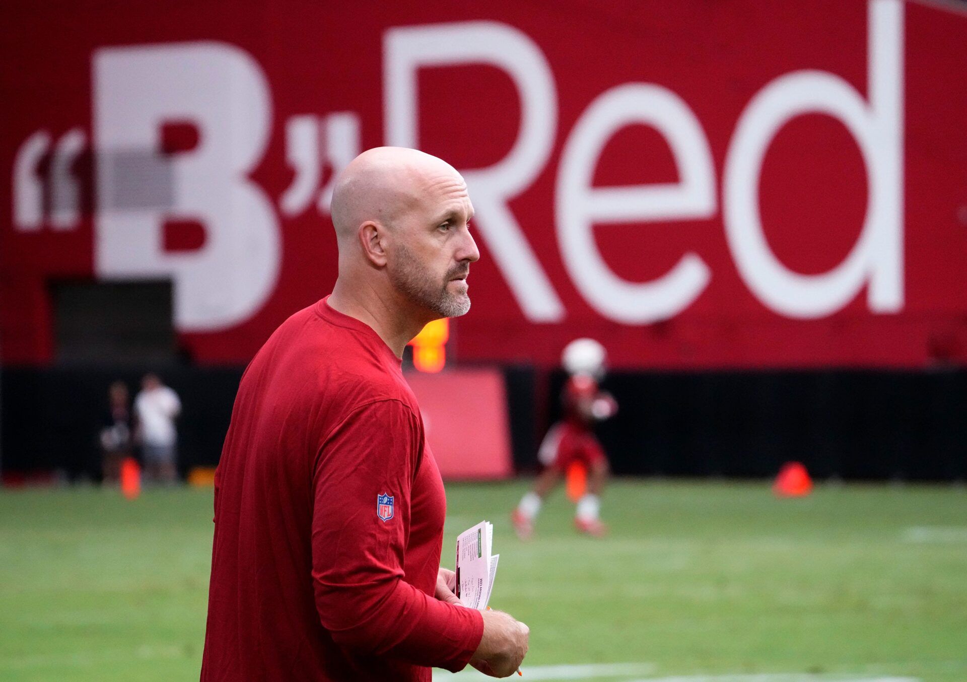 Arizona Cardinals general manager Monti Ossenfort watches practice during training camp at State Farm Stadium.