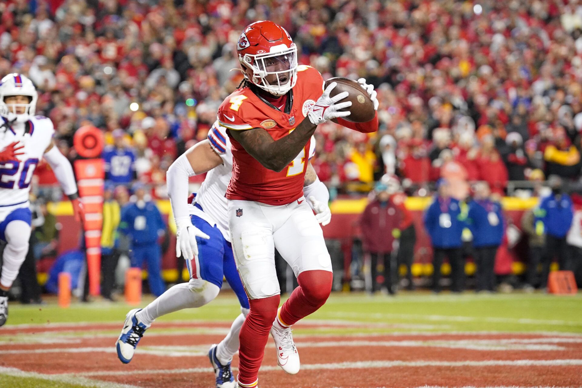 Kansas City Chiefs wide receiver Rashee Rice (4) catches a pass for a touchdown against the Buffalo Bills during the second half at GEHA Field at Arrowhead Stadium.