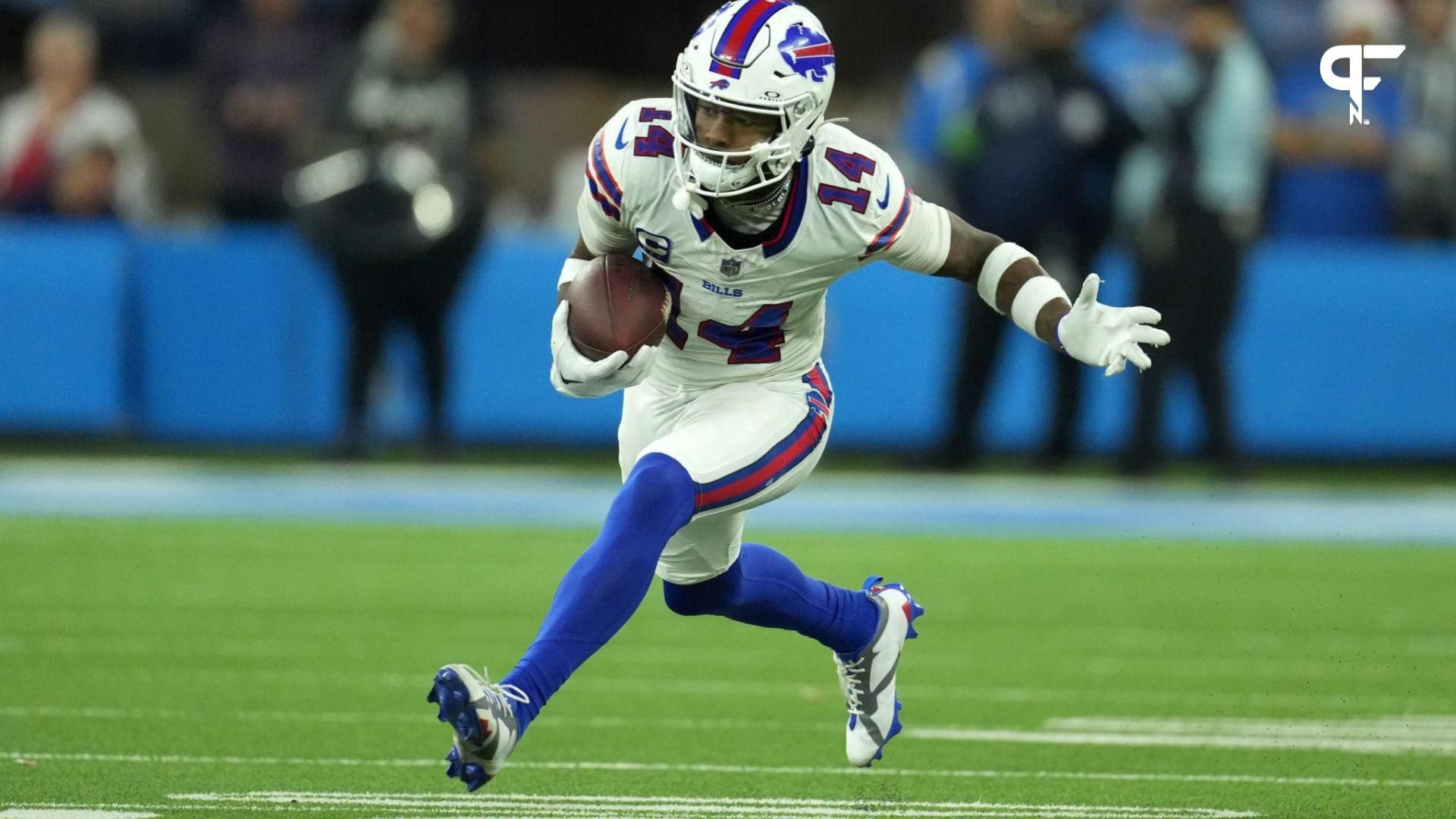 Buffalo Bills wide receiver Stefon Diggs (14) carries the ball against the Los Angeles Chargers in the second half at SoFi Stadium.