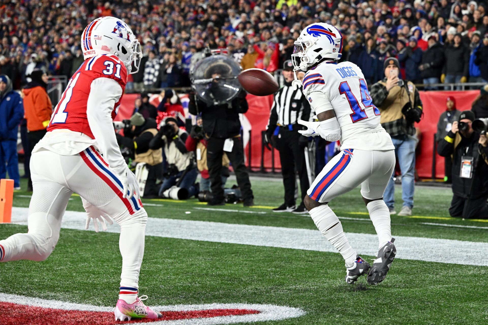 Buffalo Bills WR Stefon Diggs (14) catches a touchdown pass against the New England Patriots.