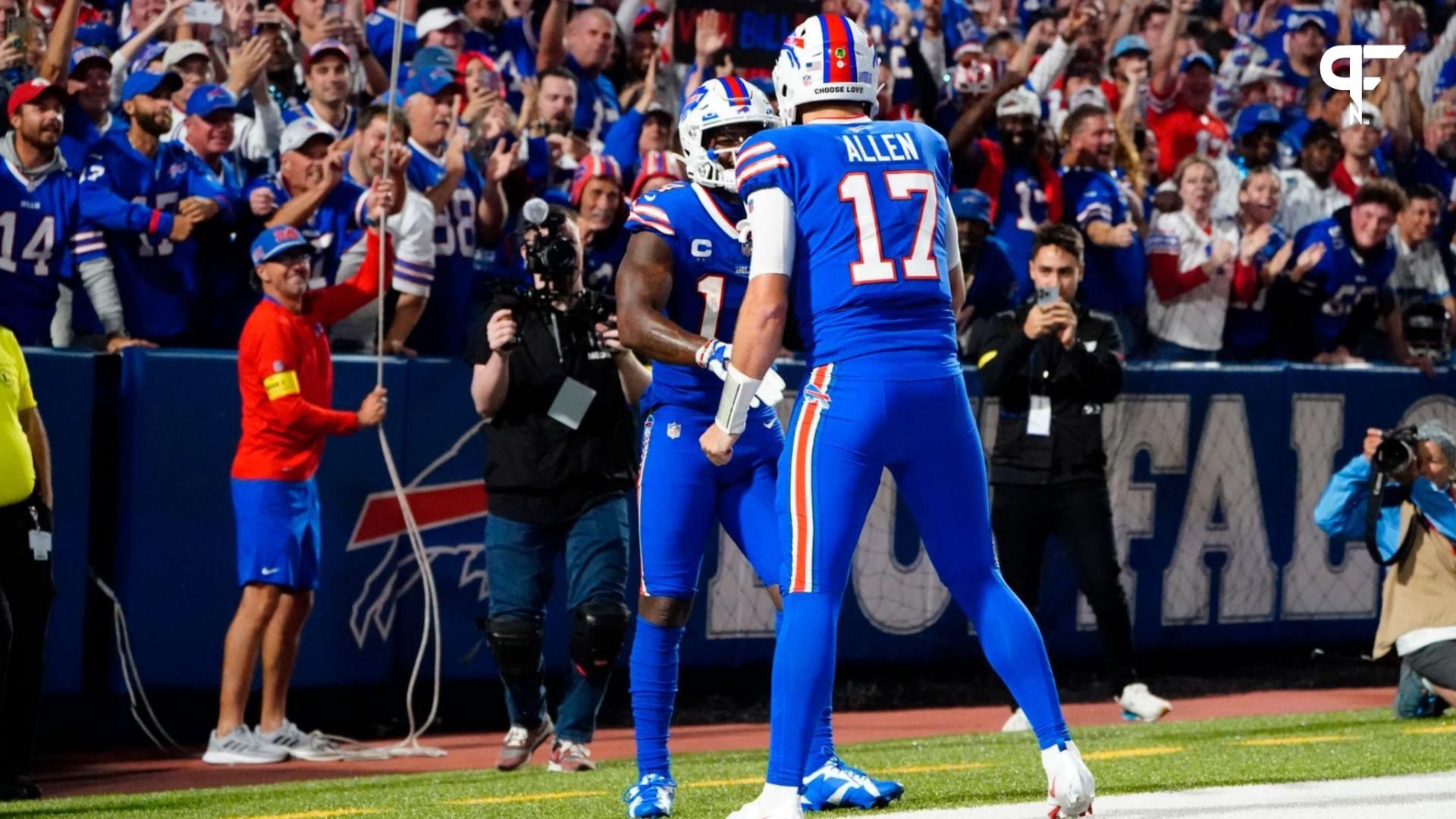 Buffalo Bills quarterback Josh Allen (17) congratulates wide receiver Stefon Diggs (14) for catching a touchdown pass during the second half at Highmark Stadium.