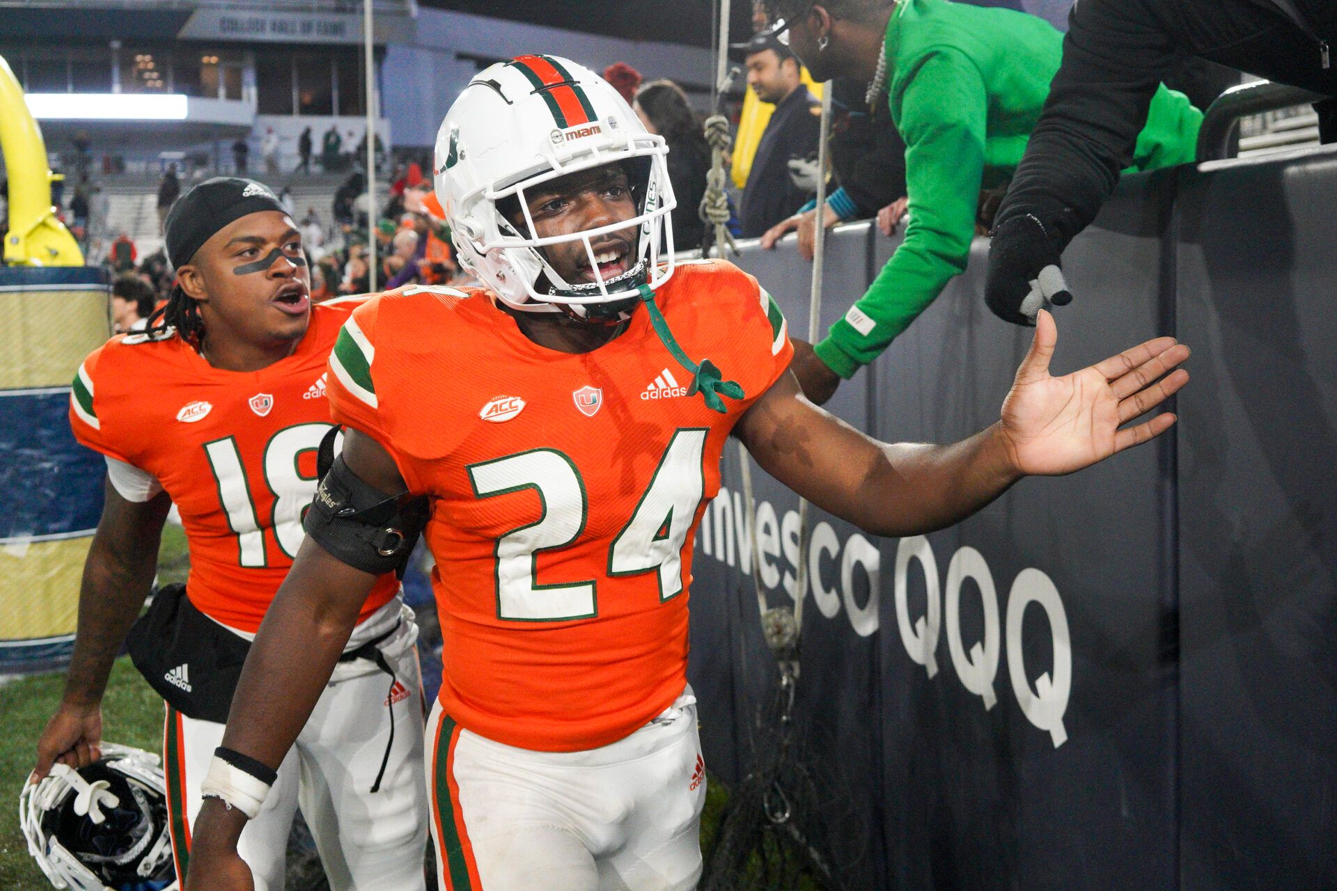 Miami Hurricanes safety Kamren Kinchens (24) celebrates with fans after a victory against the Georgia Tech Yellow Jackets at Bobby Dodd Stadium.