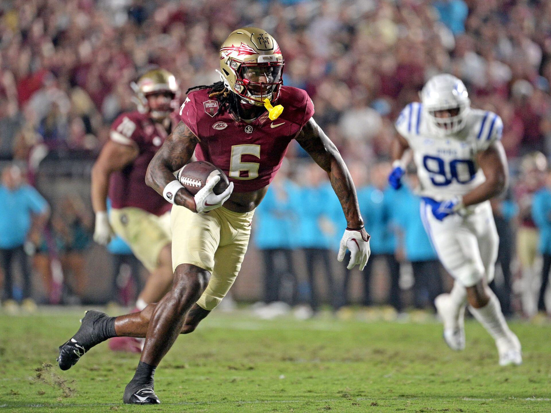 Florida State Seminoles tight end Jaheim Bell (6) runs the ball against the Duke Blue Devils in the first half at Doak S. Campbell Stadium.