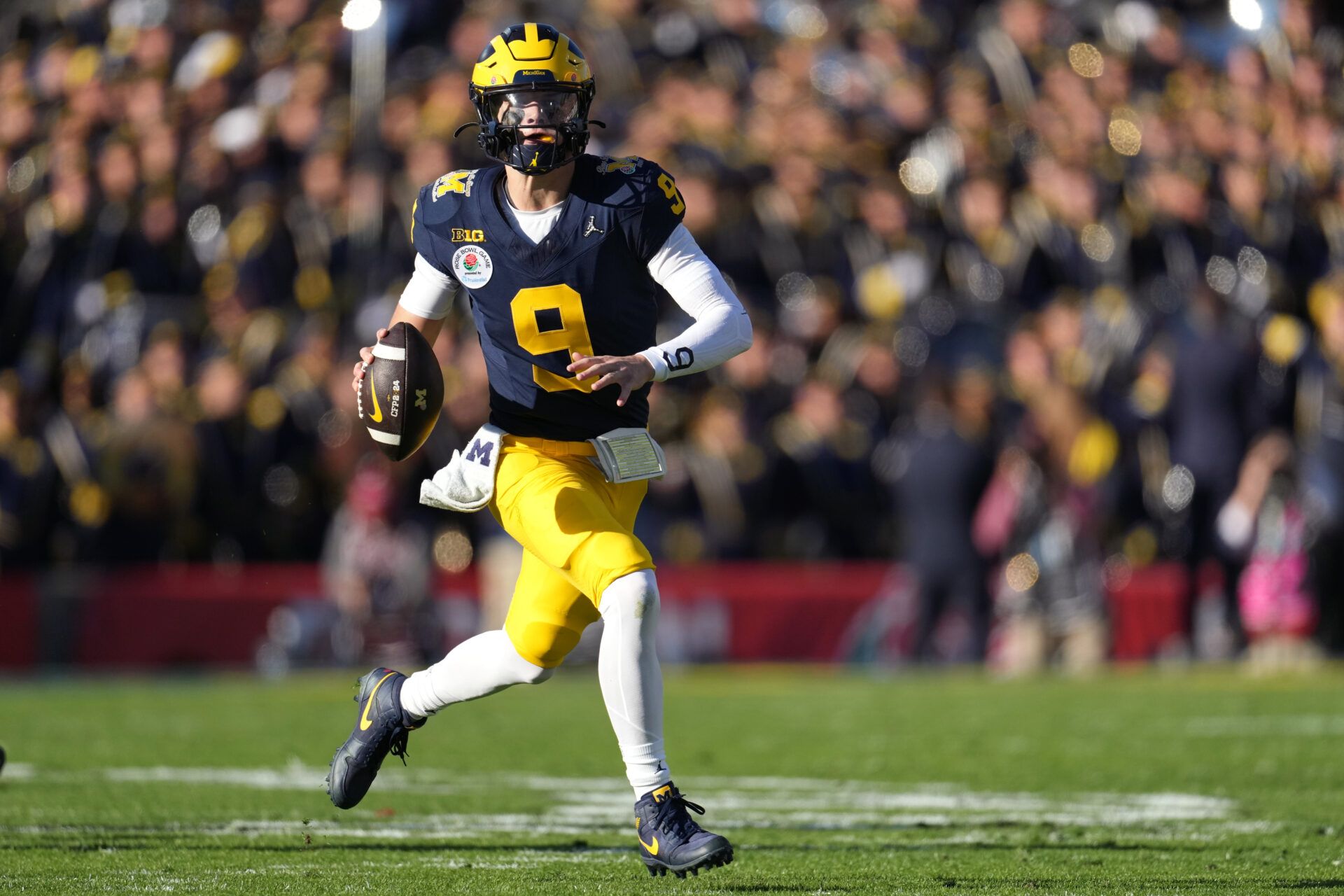 Michigan Wolverines quarterback J.J. McCarthy (9) looks to pass against the Alabama Crimson Tide during the first half in the 2024 Rose Bowl college football playoff semifinal game at Rose Bowl.