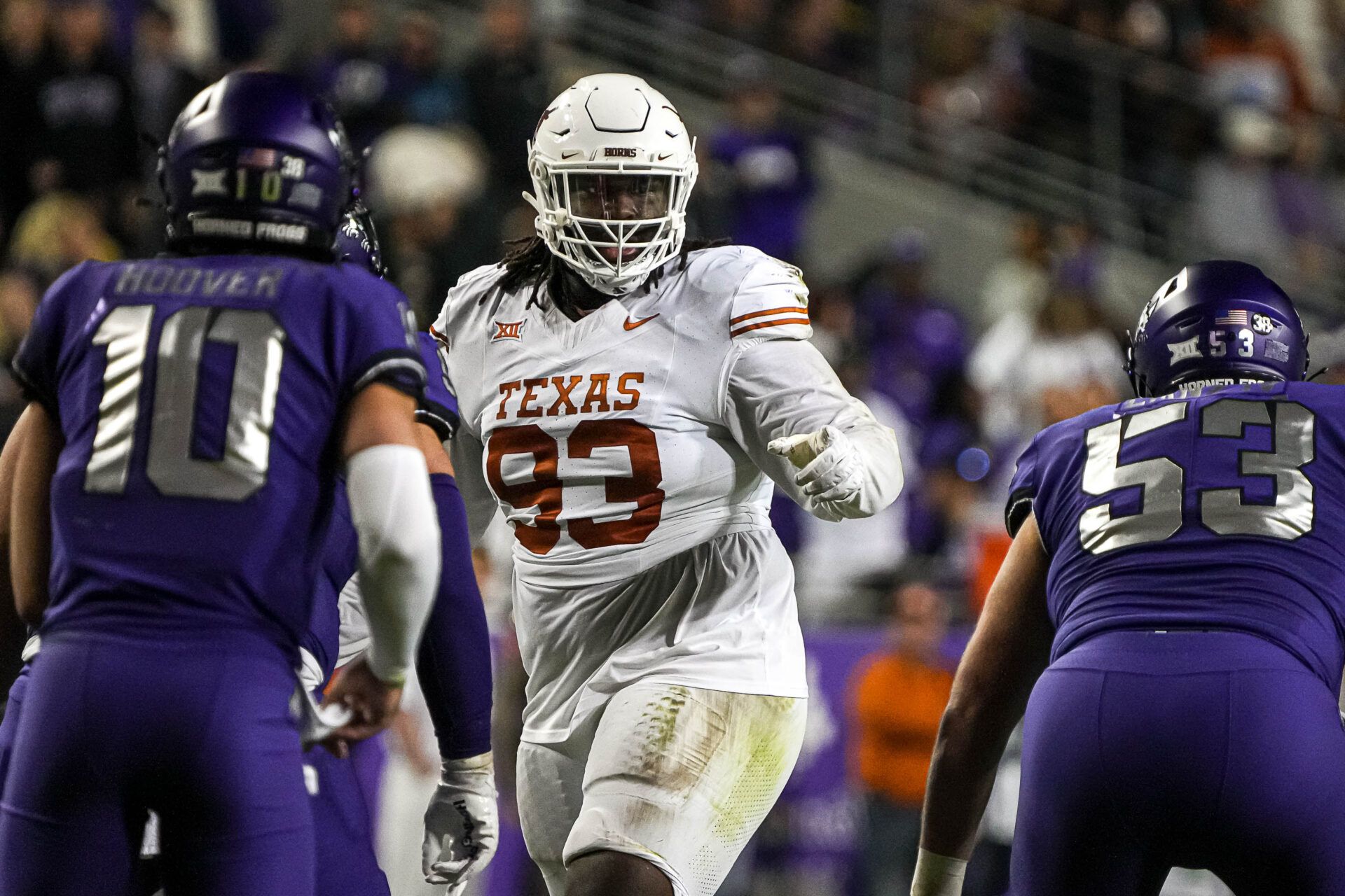 Texas Longhorns defensive lineman T'Vondre Sweat (93) directs the defense during the game against the TCU Horned Frogs at Amon G. Carter Stadium.