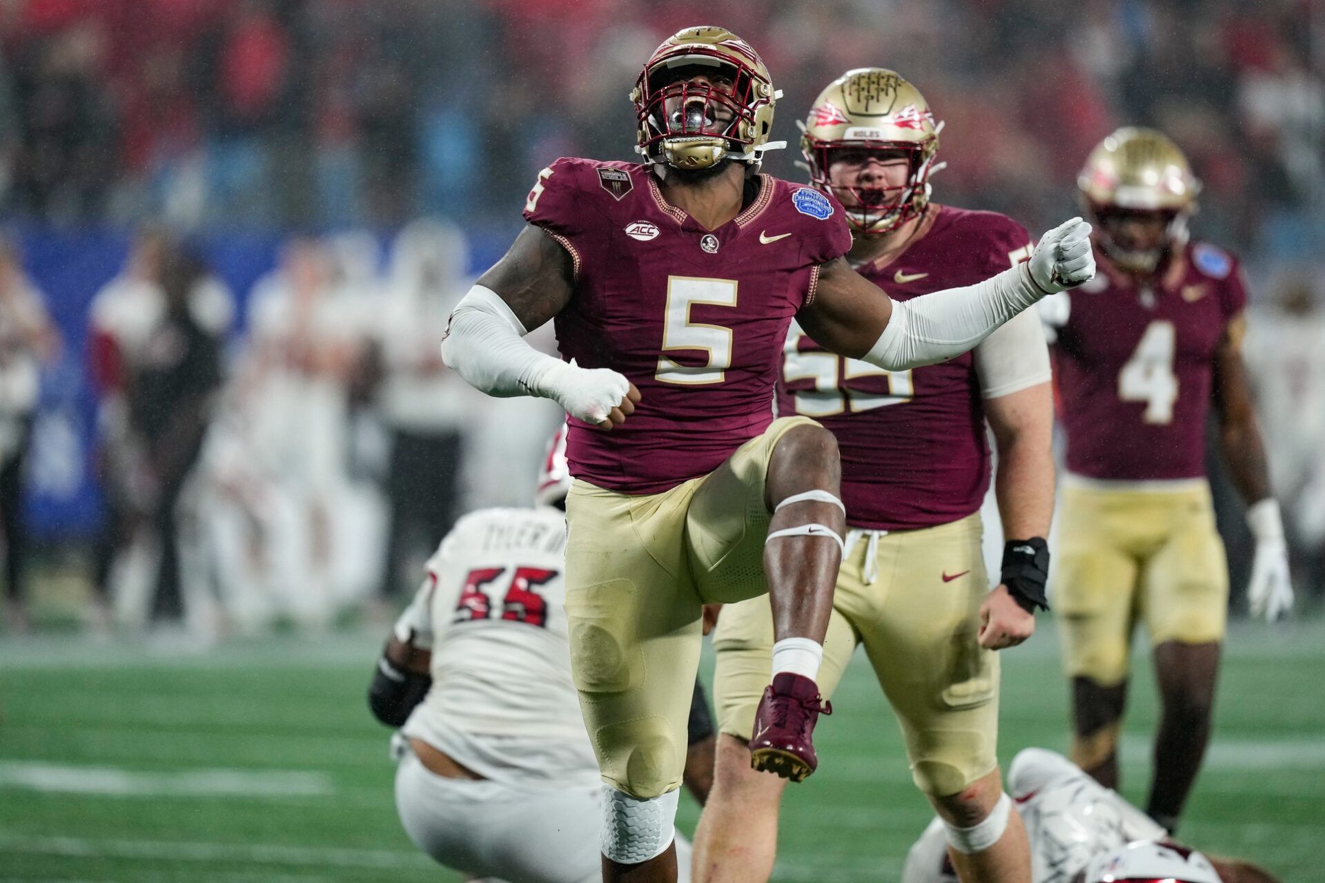 Florida State Seminoles defensive lineman Jared Verse (5) reacts during the fourth quarter against the Louisville Cardinals at Bank of America Stadium.