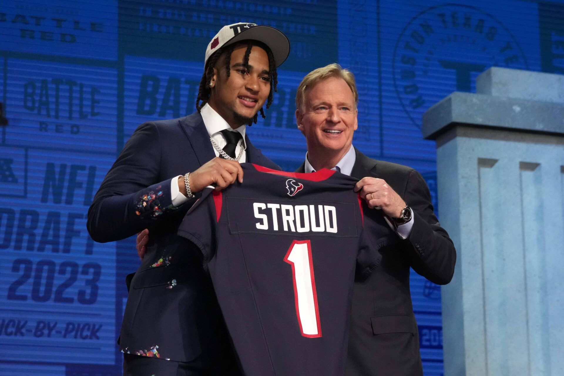 Ohio State Buckeyes quarterback CJ Stroud (left) poses with NFL commissioner Roger Goodell after being selected as the No. 2 pick in the first round of the 2023 NFL Draft at Union Station.