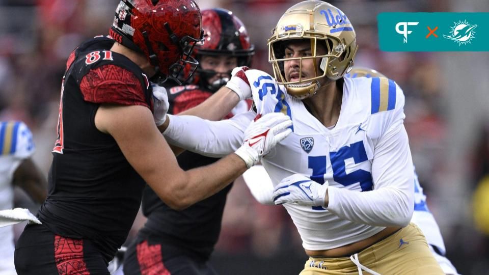 UCLA Bruins defensive lineman Laiatu Latu (15) battles against San Diego State Aztecs tight end Mark Redman (81) during the first half at Snapdragon Stadium.