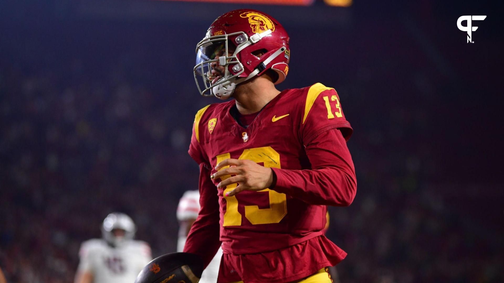 Southern California Trojans quarterback Caleb Williams (13) celebrates his touchdown scored against the Arizona Wildcats during the first overtime at Los Angeles Memorial Coliseum.