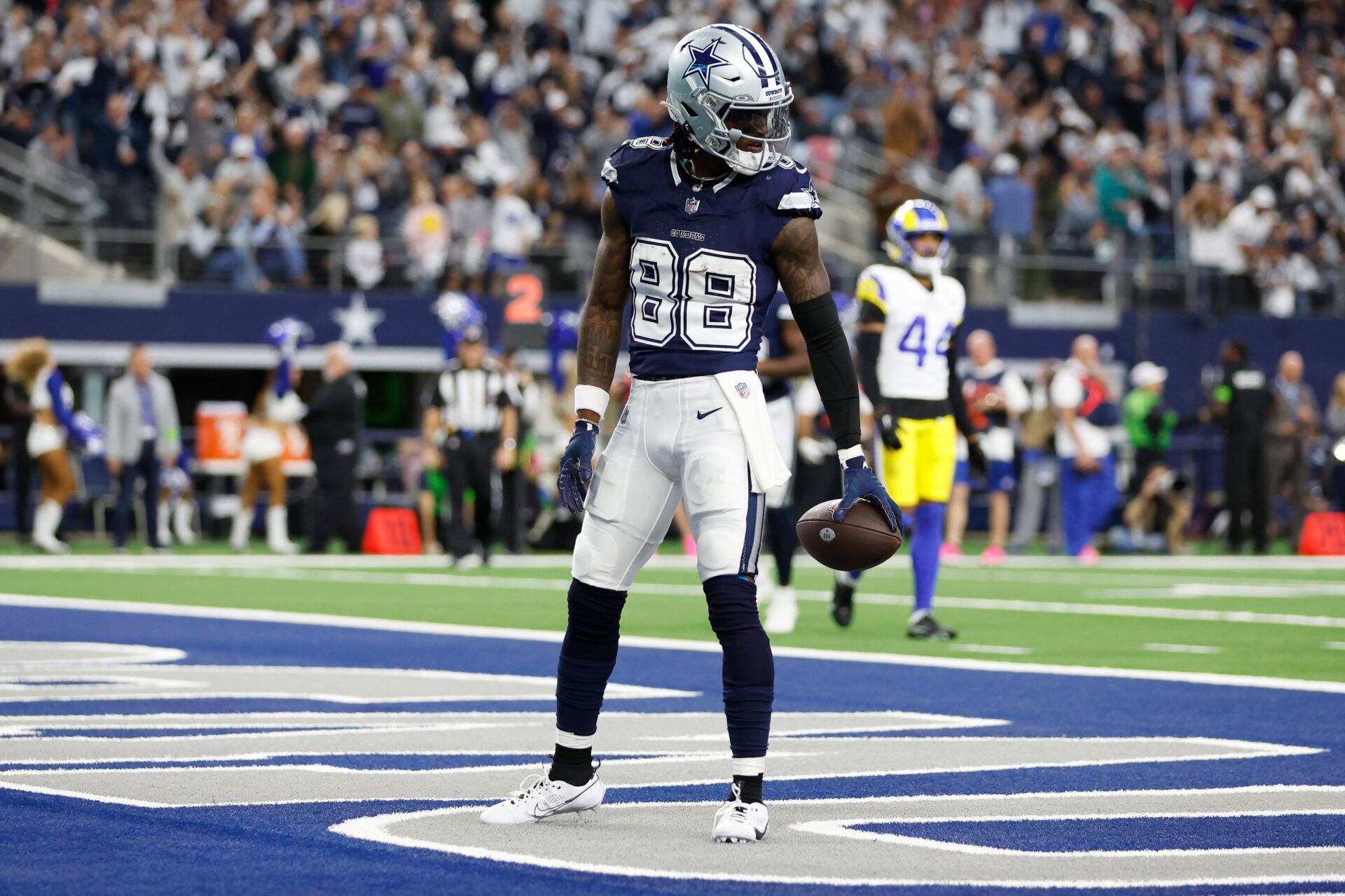 Dallas Cowboys wide receiver CeeDee Lamb (88) reacts after catching a touchdown pass in the second quarter against the Los Angeles Rams at AT&T Stadium.