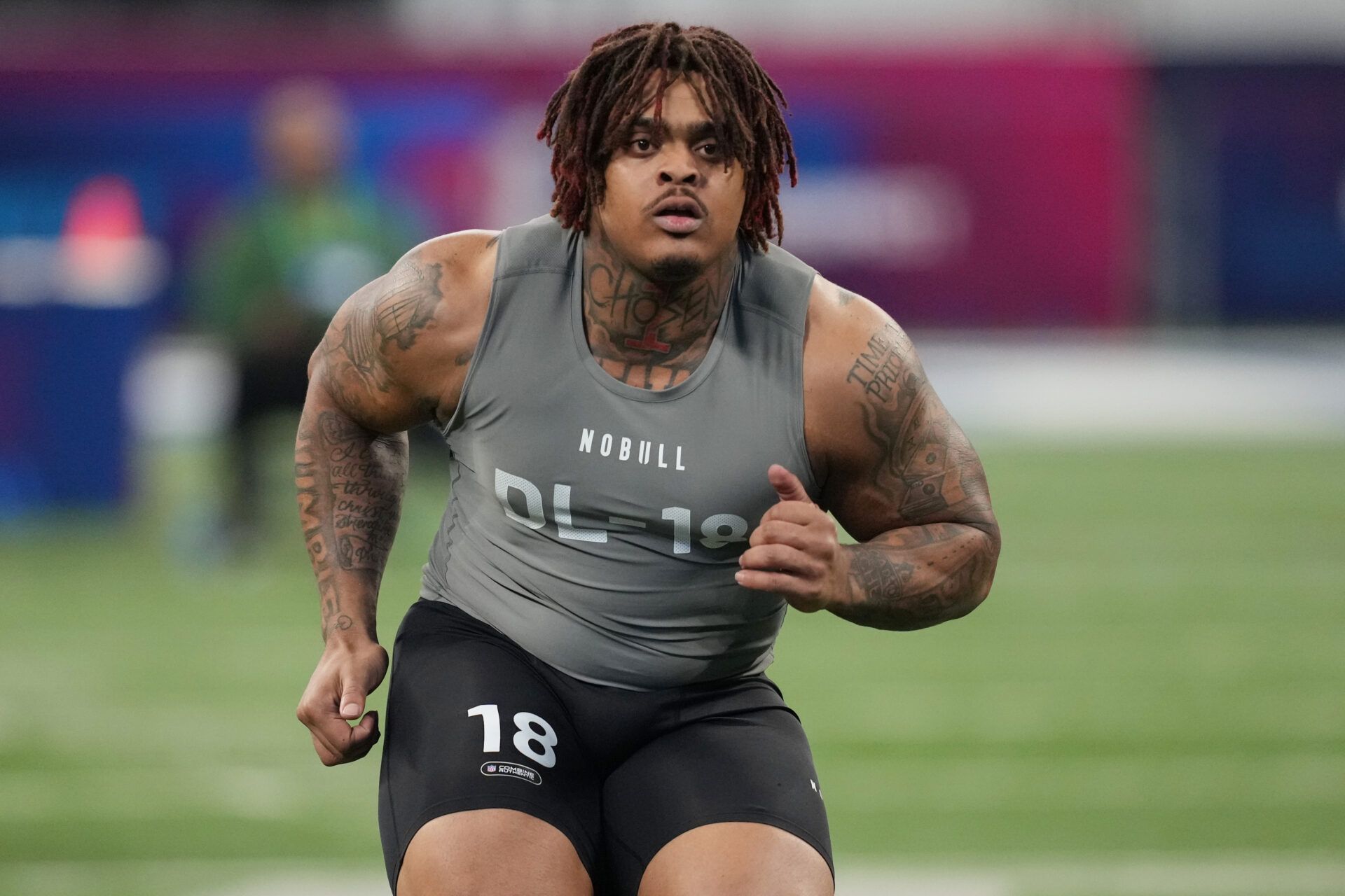 Texas defensive lineman Byron Murphy (DL18) works out during the 2024 NFL Combine at Lucas Oil Stadium.