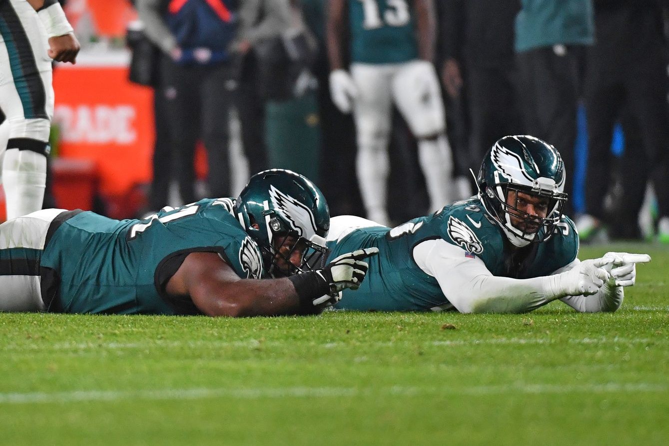 Philadelphia Eagles defensive tackle Fletcher Cox (91) and defensive end Brandon Graham (55) ceberate a sack against the San Francisco 49ers during the third quarter at Lincoln Financial Field.