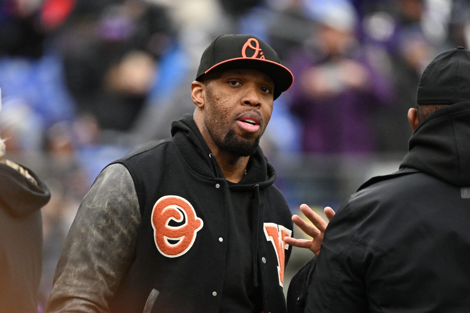 Former Baltimore Ravens Terrell Suggs looks on from the field prior to the AFC Championship football game against the Kansas City Chiefs at M&T Bank Stadium.