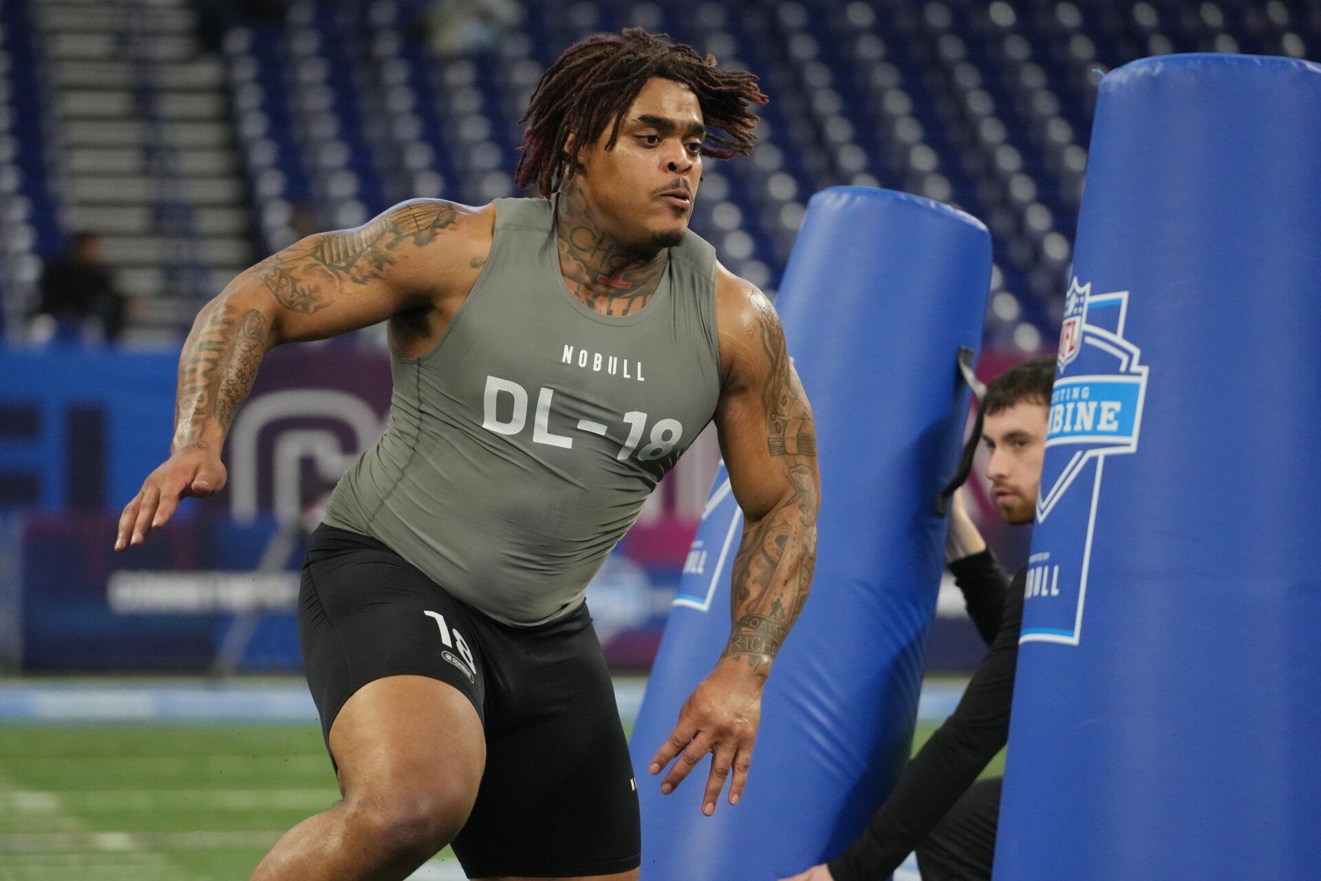 Texas defensive lineman Byron Murphy (DL18) works out during the 2024 NFL Combine at Lucas Oil Stadium.