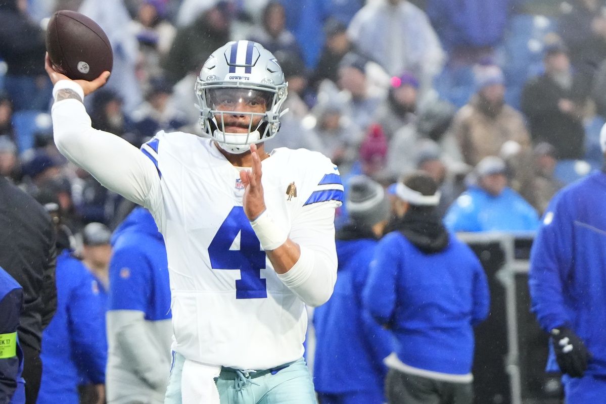 Dallas Cowboys quarterback Dak Prescott (4) warms-up before the game against the Buffalo Bills at Highmark Stadium.