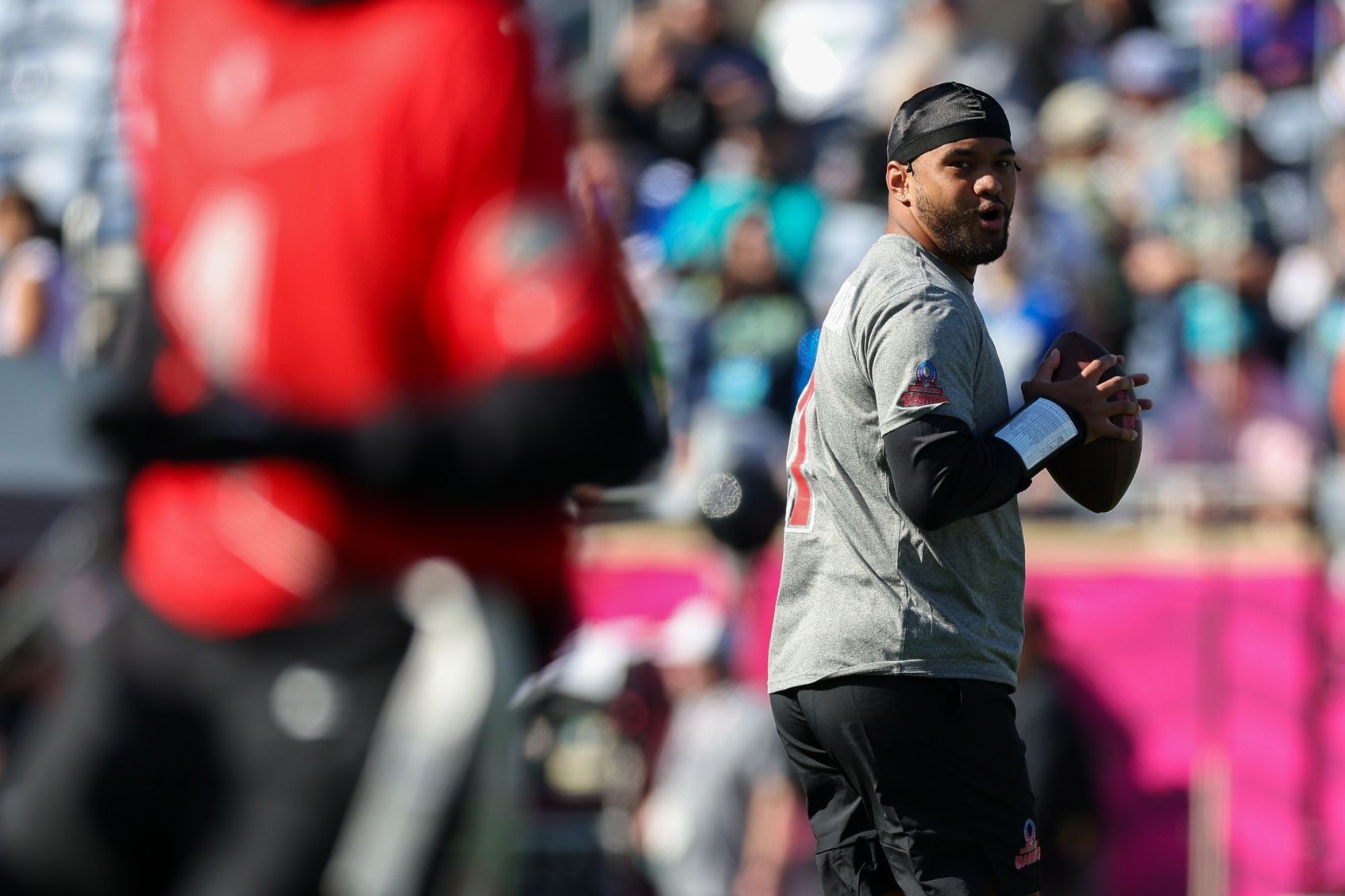 Miami Dolphins quarterback Tua Tagovailoa (1) participates in the AFC versus NFC Pro Bowl practice and media day at Camping World Stadium.