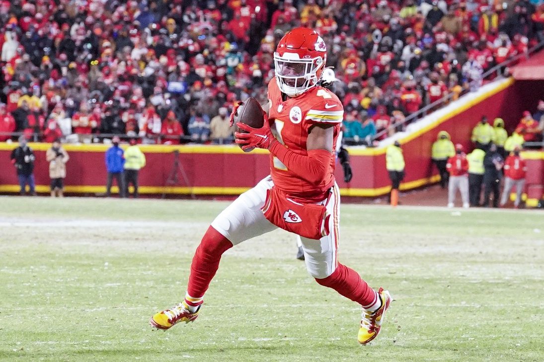 Kansas City Chiefs wide receiver Rashee Rice (4) catches a pass against the Miami Dolphins in a 2024 AFC wild card game at GEHA Field at Arrowhead Stadium.