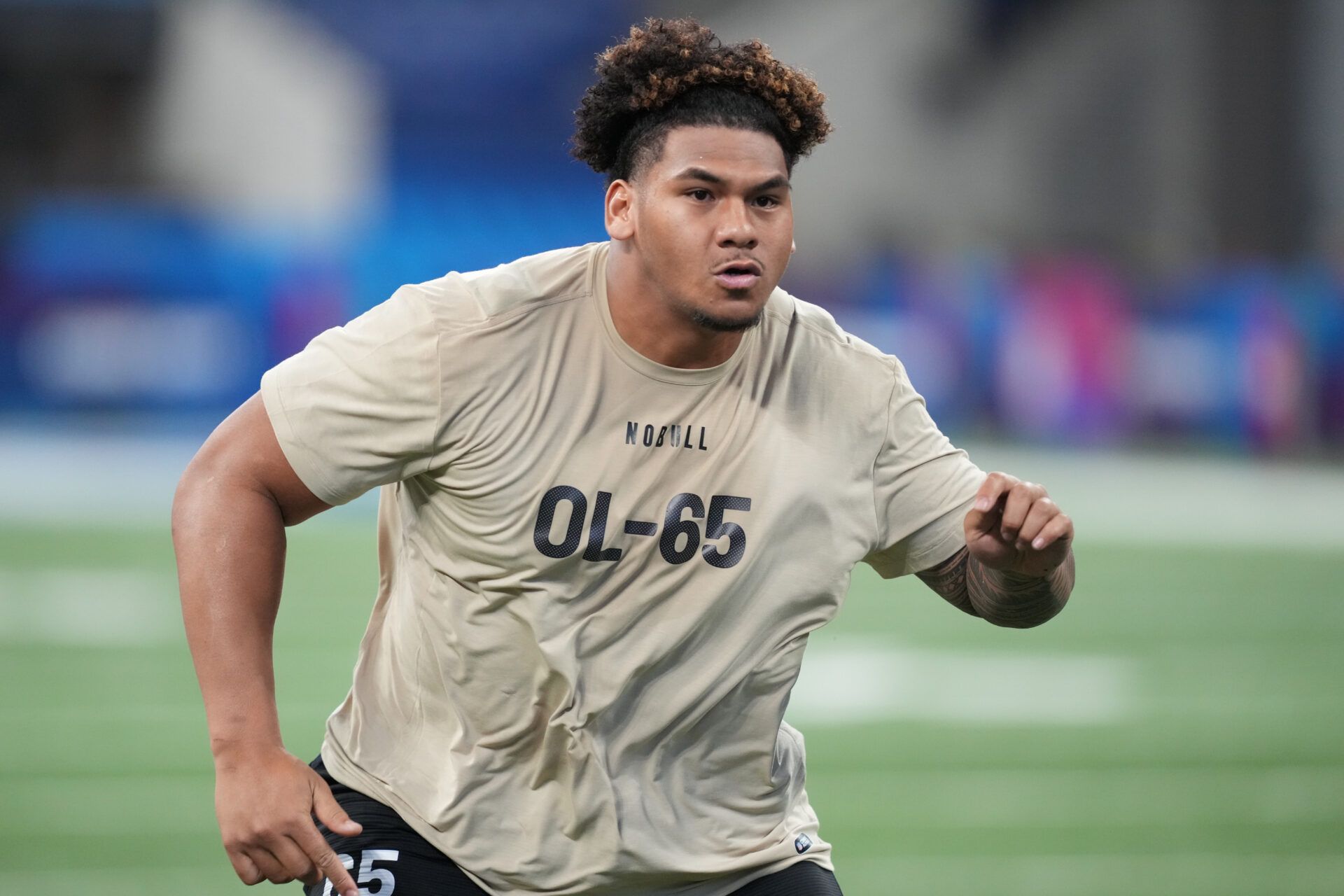 Brigham Young offensive lineman Kingsley Suamataia (OL65) during the 2024 NFL Combine at Lucas Oil Stadium.