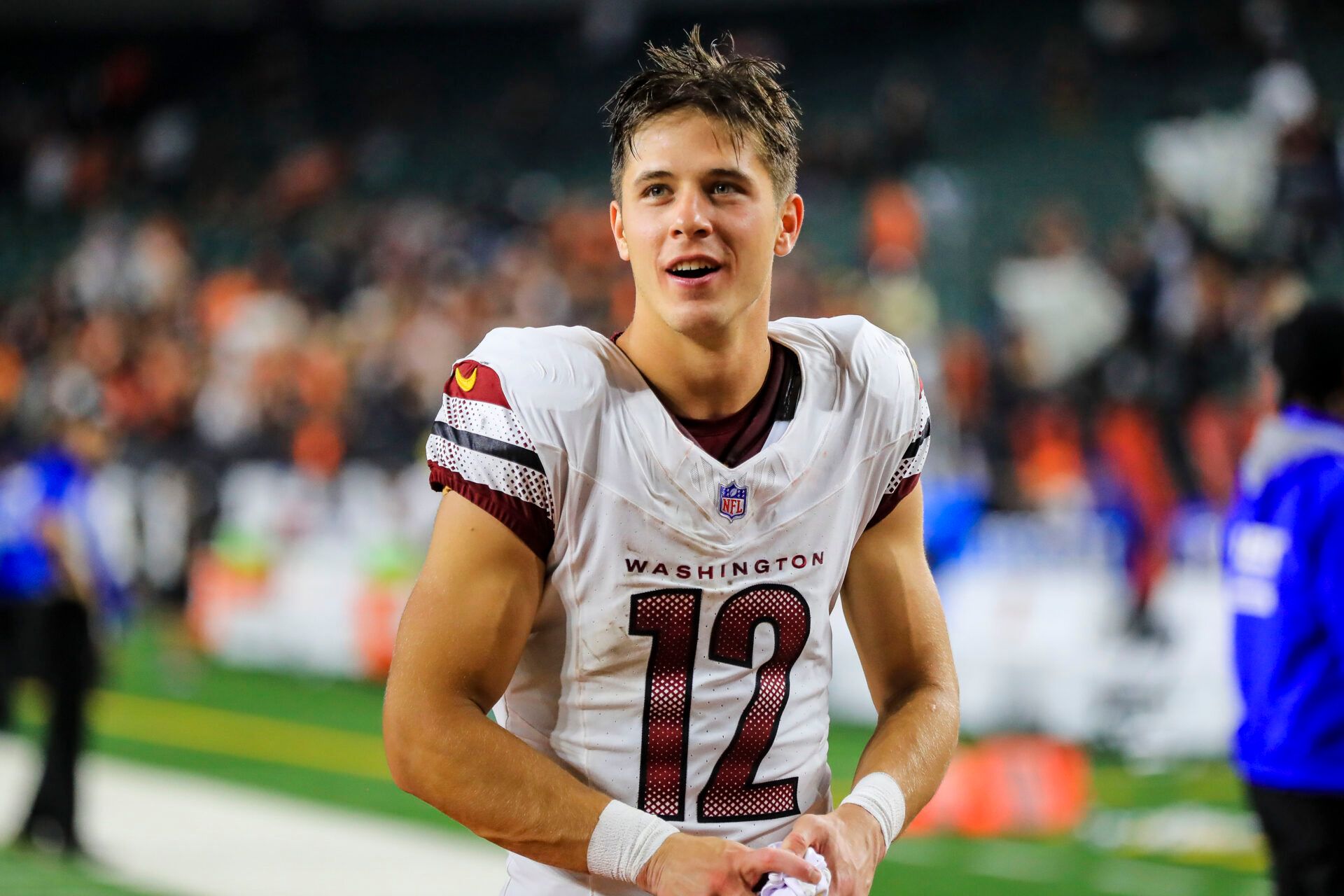 Sep 23, 2024; Cincinnati, Ohio, USA; Washington Commanders wide receiver Luke McCaffrey (12) acknowledges fans after the victory over the Cincinnati Bengals at Paycor Stadium. Mandatory Credit: Katie Stratman-Imagn Images